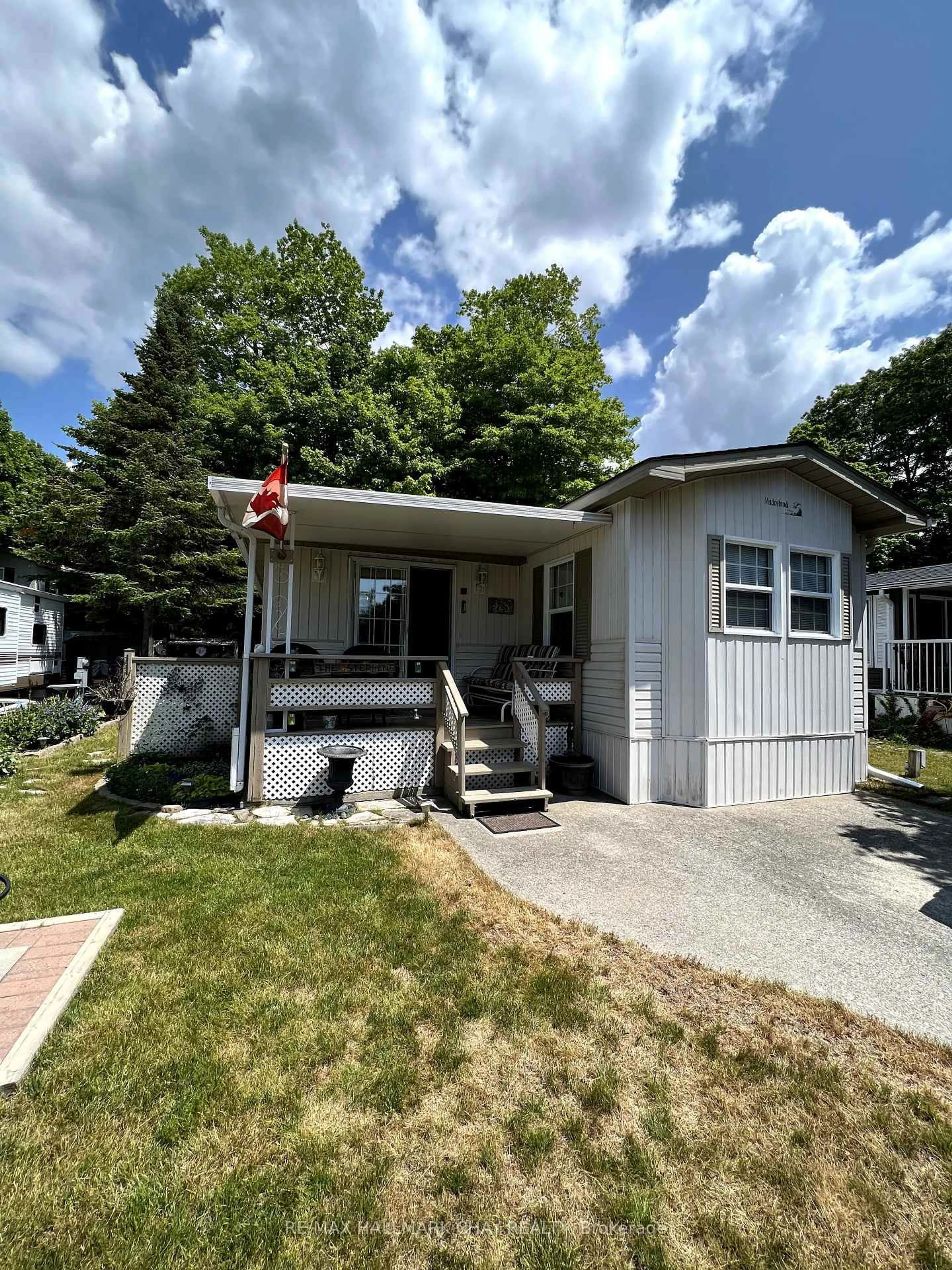 Home with vinyl exterior material, street for 47 Sauble Falls Pkwy #8, South Bruce Peninsula Ontario N0H 2G0