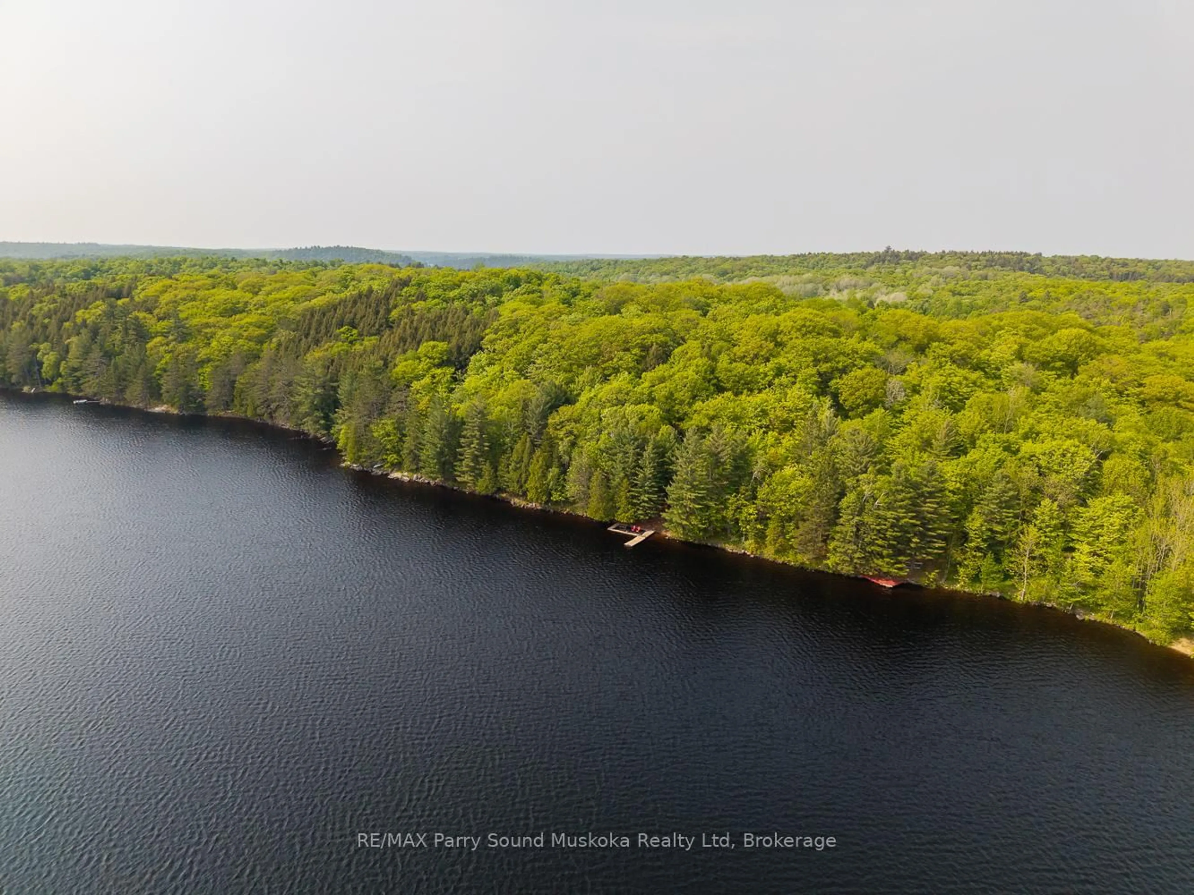 A pic from outside/outdoor area/front of a property/back of a property/a pic from drone, water/lake/river/ocean view for 40 Jack and Verna's Lane, Magnetawan Ontario P0A 1P0