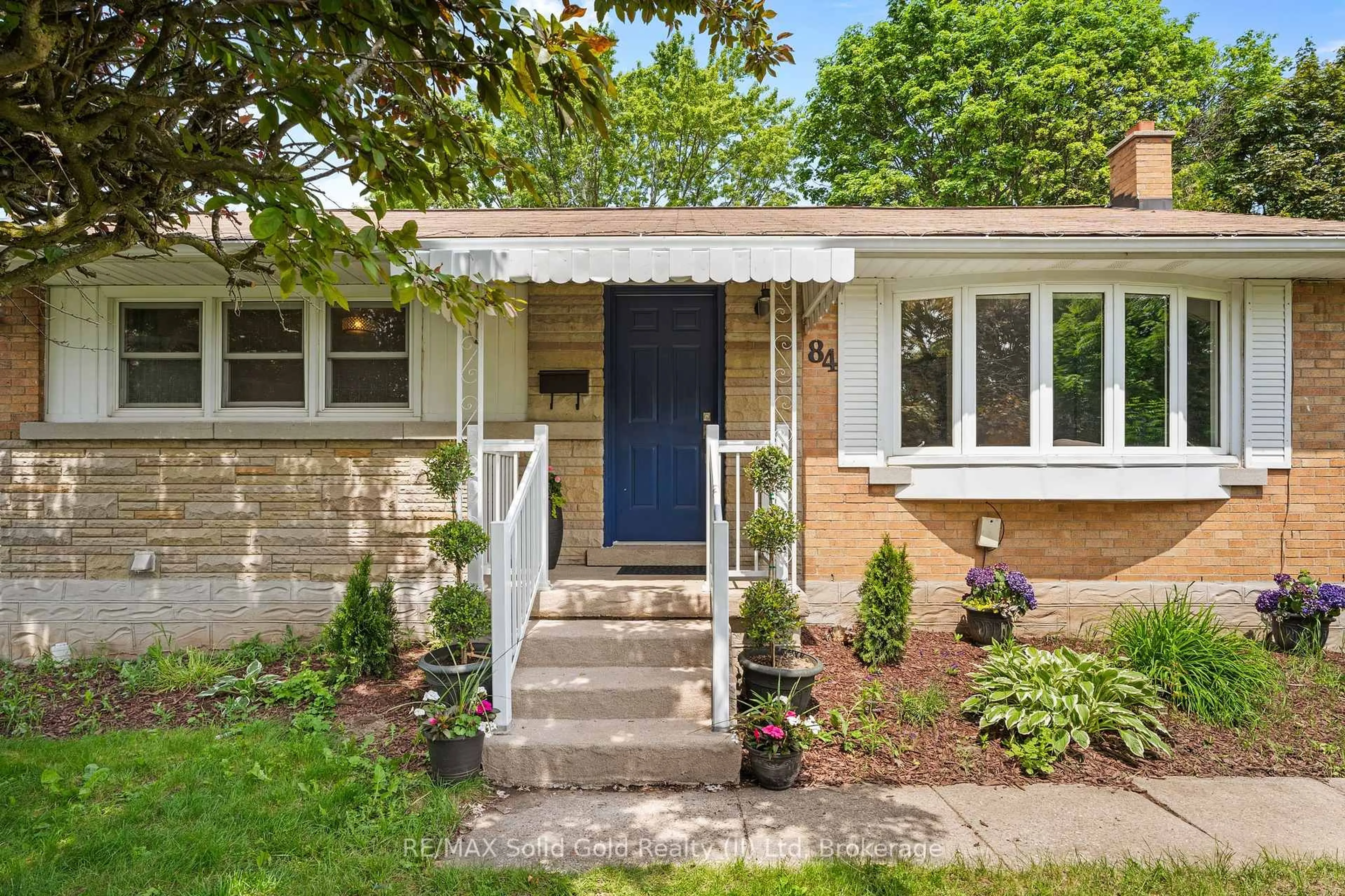 Home with brick exterior material, street for 84 Elgin Cres, Waterloo Ontario N2J 2S2