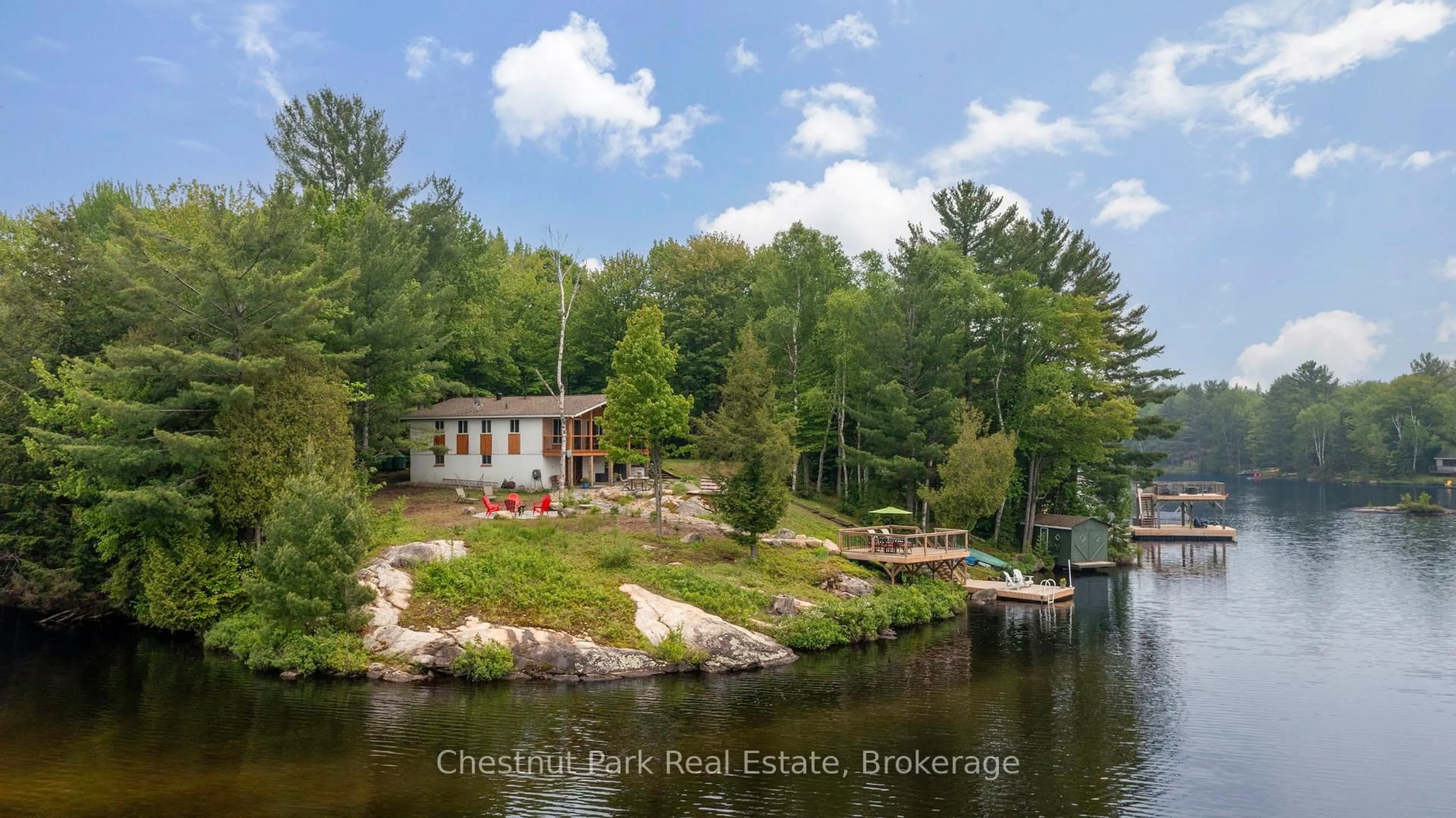 A pic from outside/outdoor area/front of a property/back of a property/a pic from drone, water/lake/river/ocean view for 4 Mallard Lane, Lake of Bays Ontario P0B 1A0