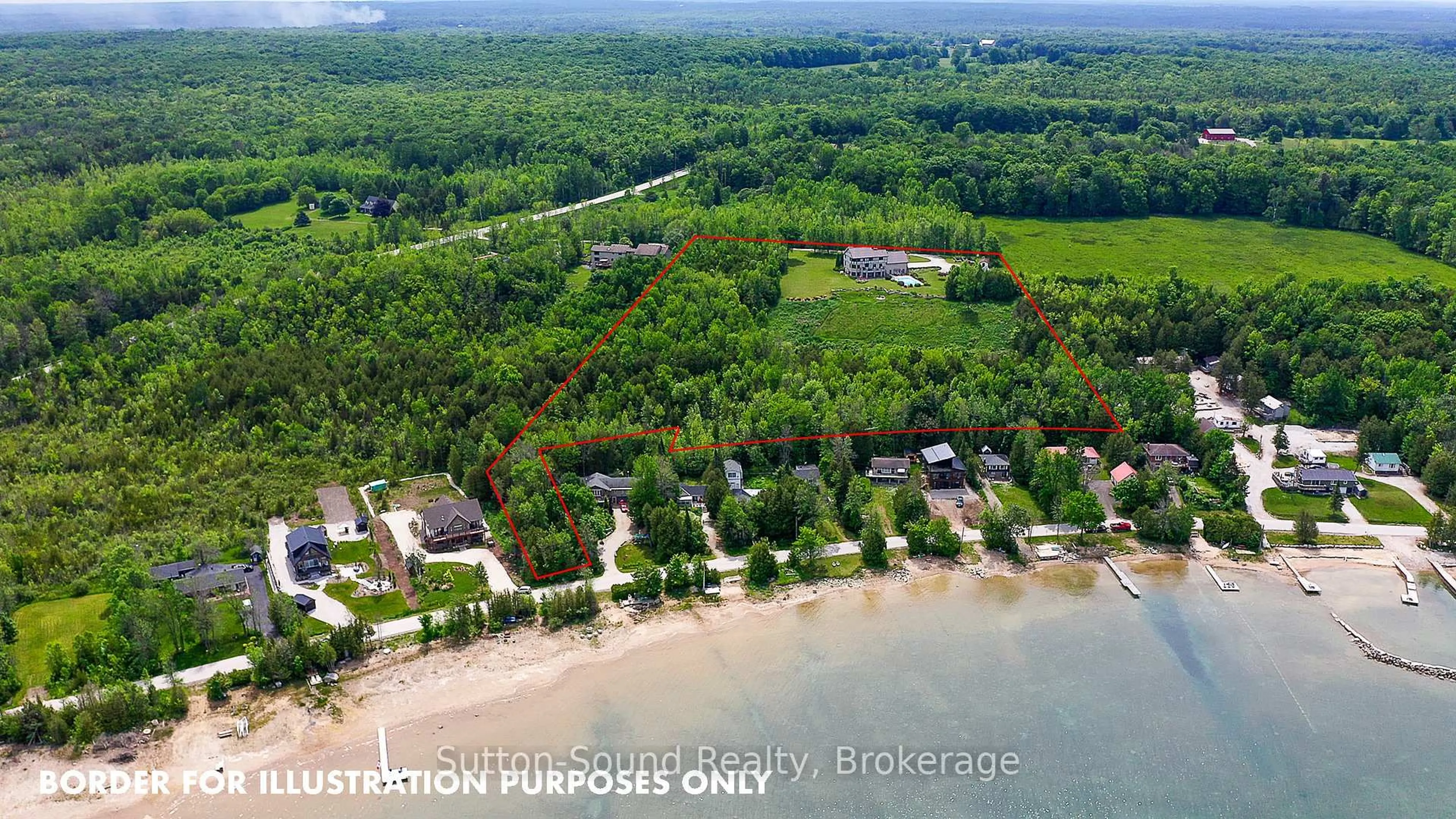 A pic from outside/outdoor area/front of a property/back of a property/a pic from drone, water/lake/river/ocean view for 502121 Grey 1 Rd, Georgian Bluffs Ontario N0H 2T0