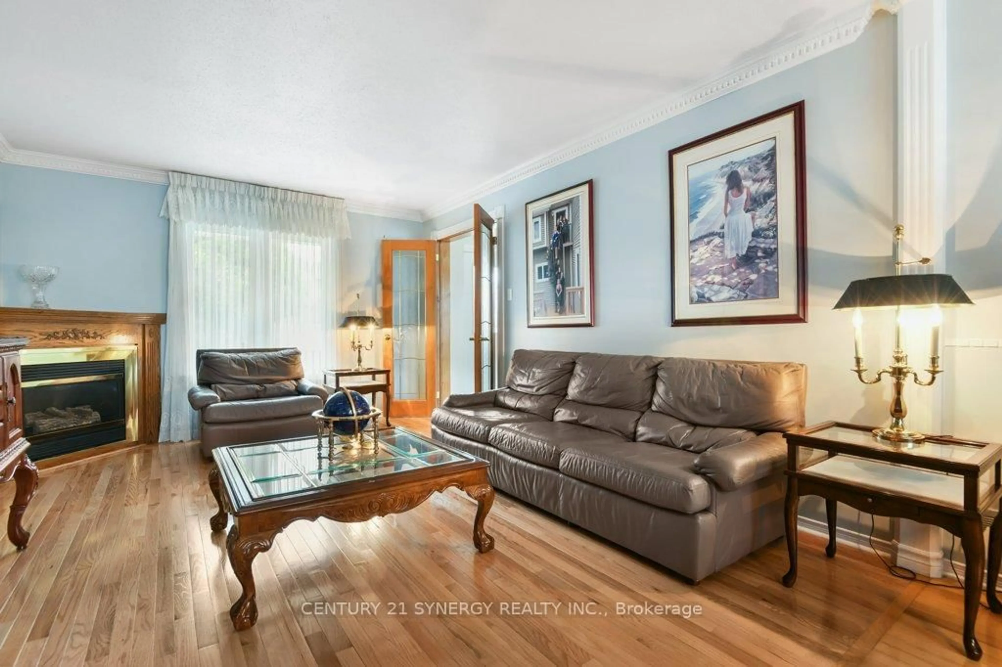 Living room with furniture, wood/laminate floor for 51 Mika St, Ottawa Ontario K2S 1K6