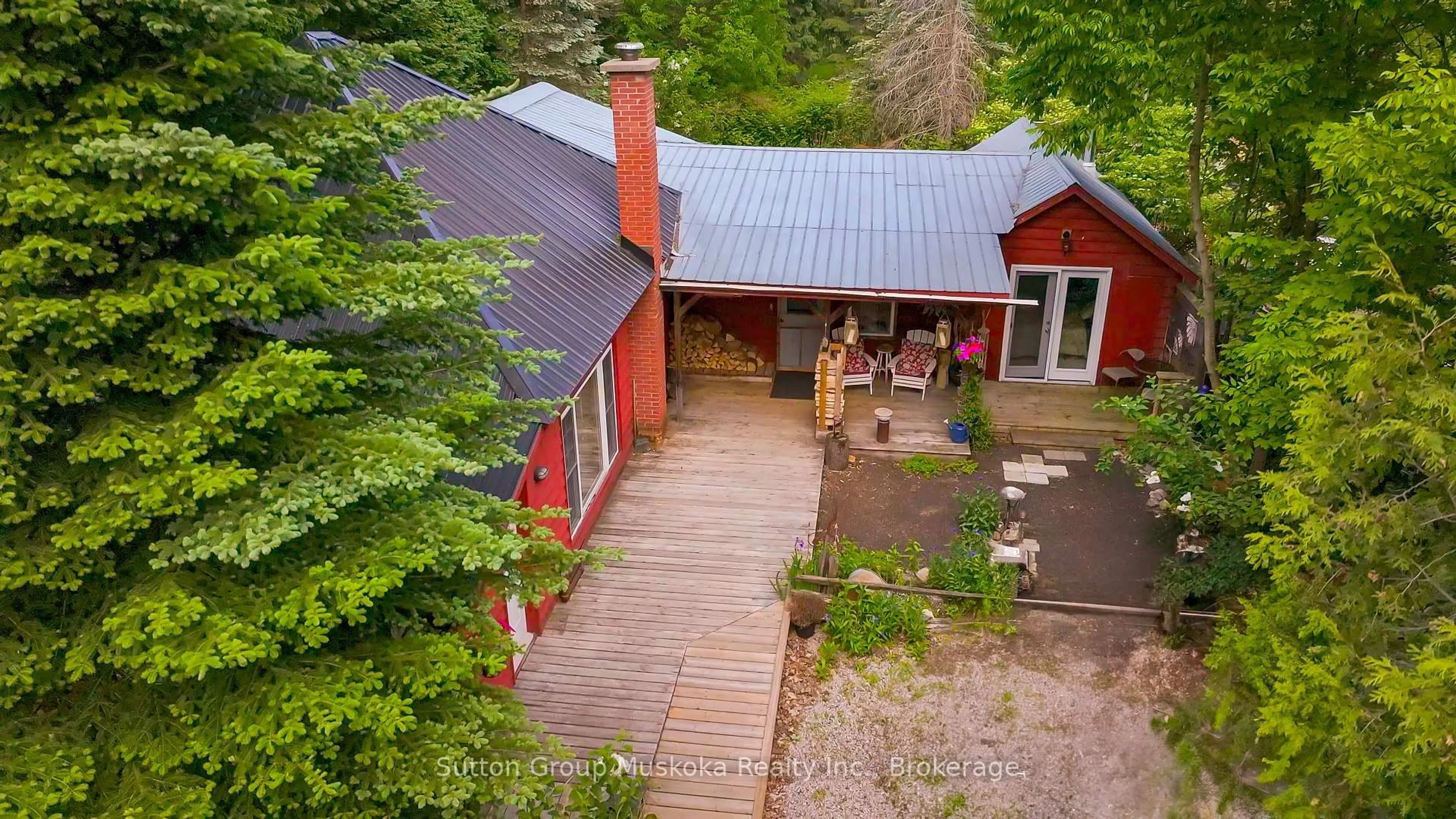 A pic from outside/outdoor area/front of a property/back of a property/a pic from drone, unknown for 254 Brunel Rd, Huntsville Ontario P1H 1R6