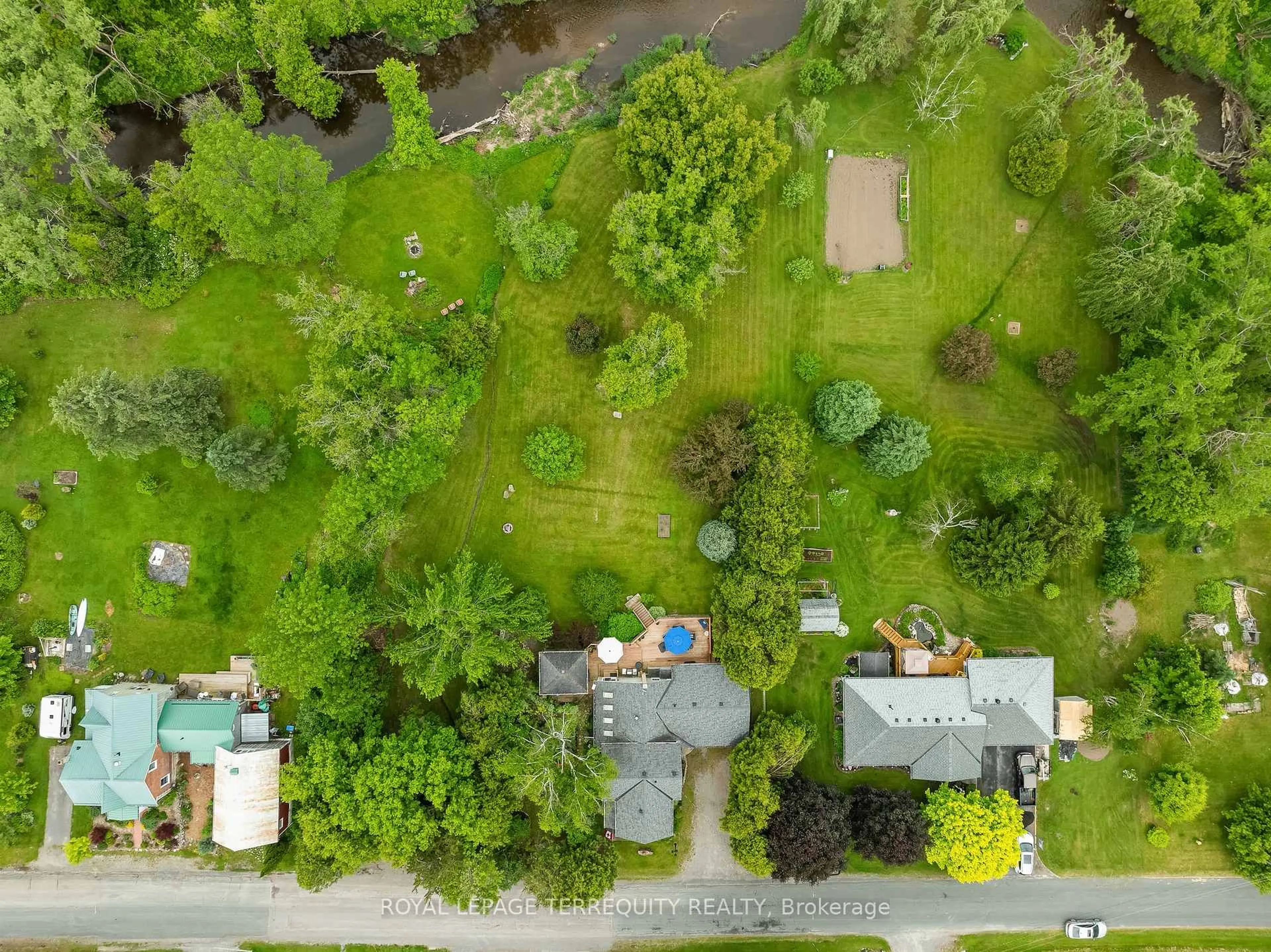 A pic from outside/outdoor area/front of a property/back of a property/a pic from drone, forest/trees view for 21 Concession St, Trent Hills Ontario K0K 3K0
