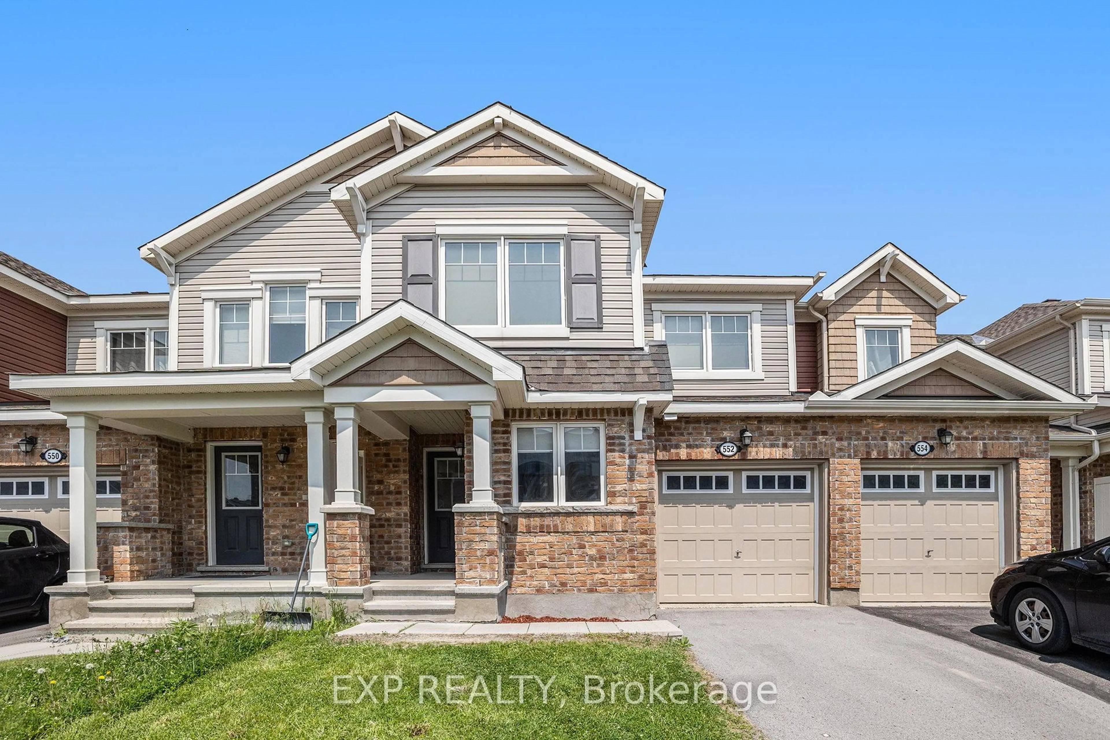 Home with brick exterior material, street for 552 Roundleaf Way, Ottawa Ontario K2V 0K3