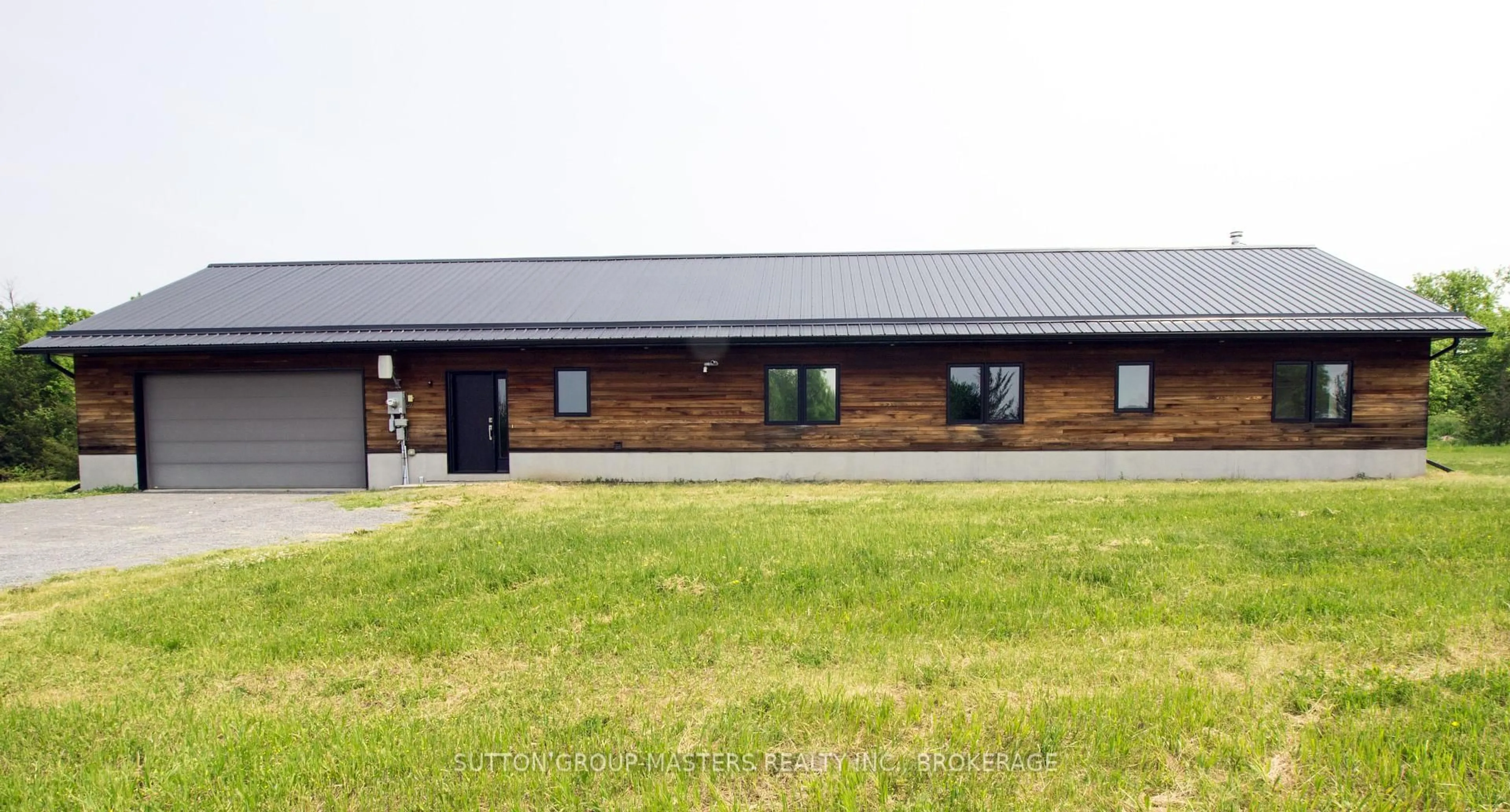A pic from outside/outdoor area/front of a property/back of a property/a pic from drone, building for 2621 County Road 6 Rd, Yarker Ontario K0K 3N0