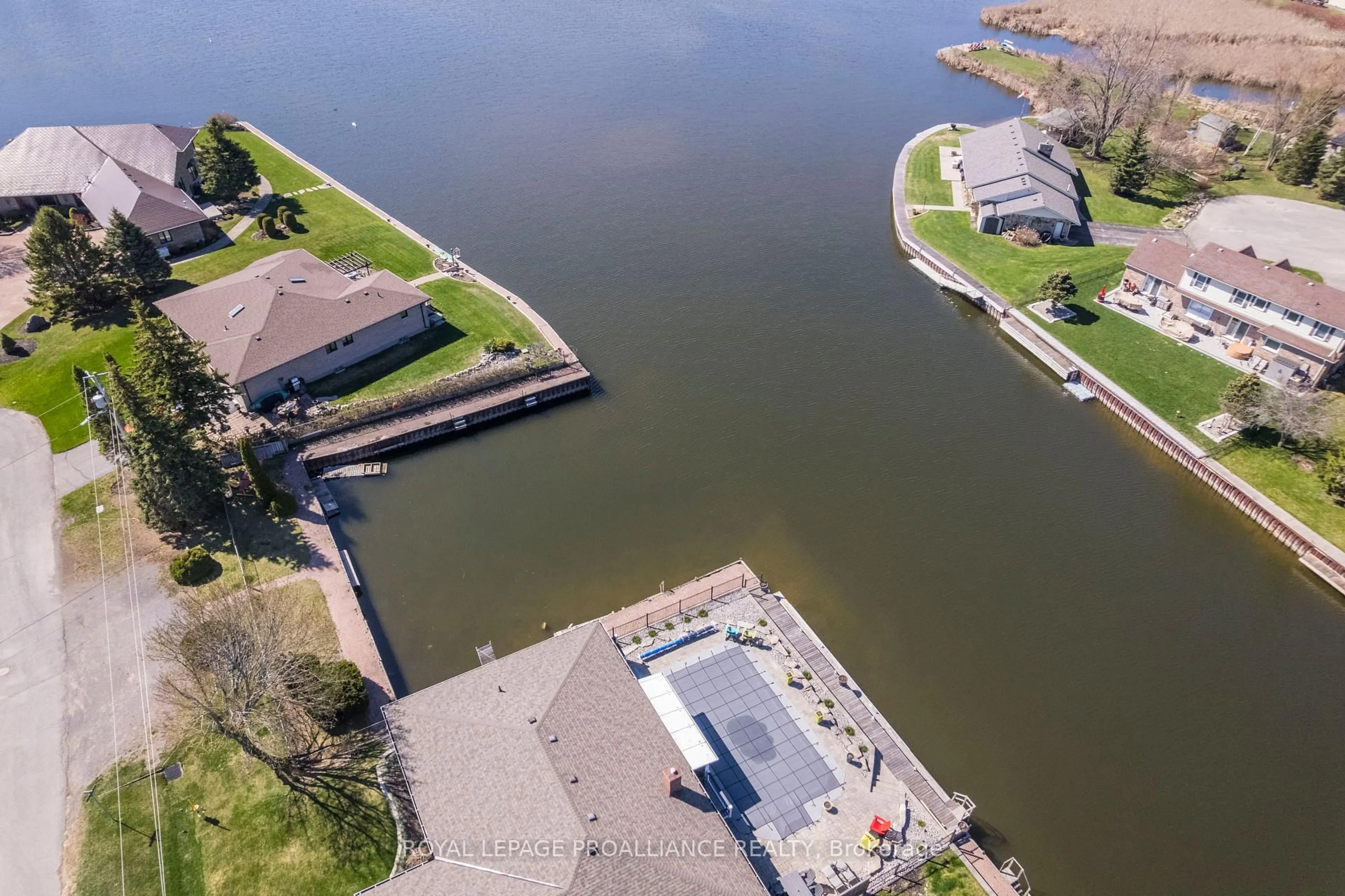 A pic from outside/outdoor area/front of a property/back of a property/a pic from drone, water/lake/river/ocean view for 7 Brintnell Blvd, Brighton Ontario K0K 1H0