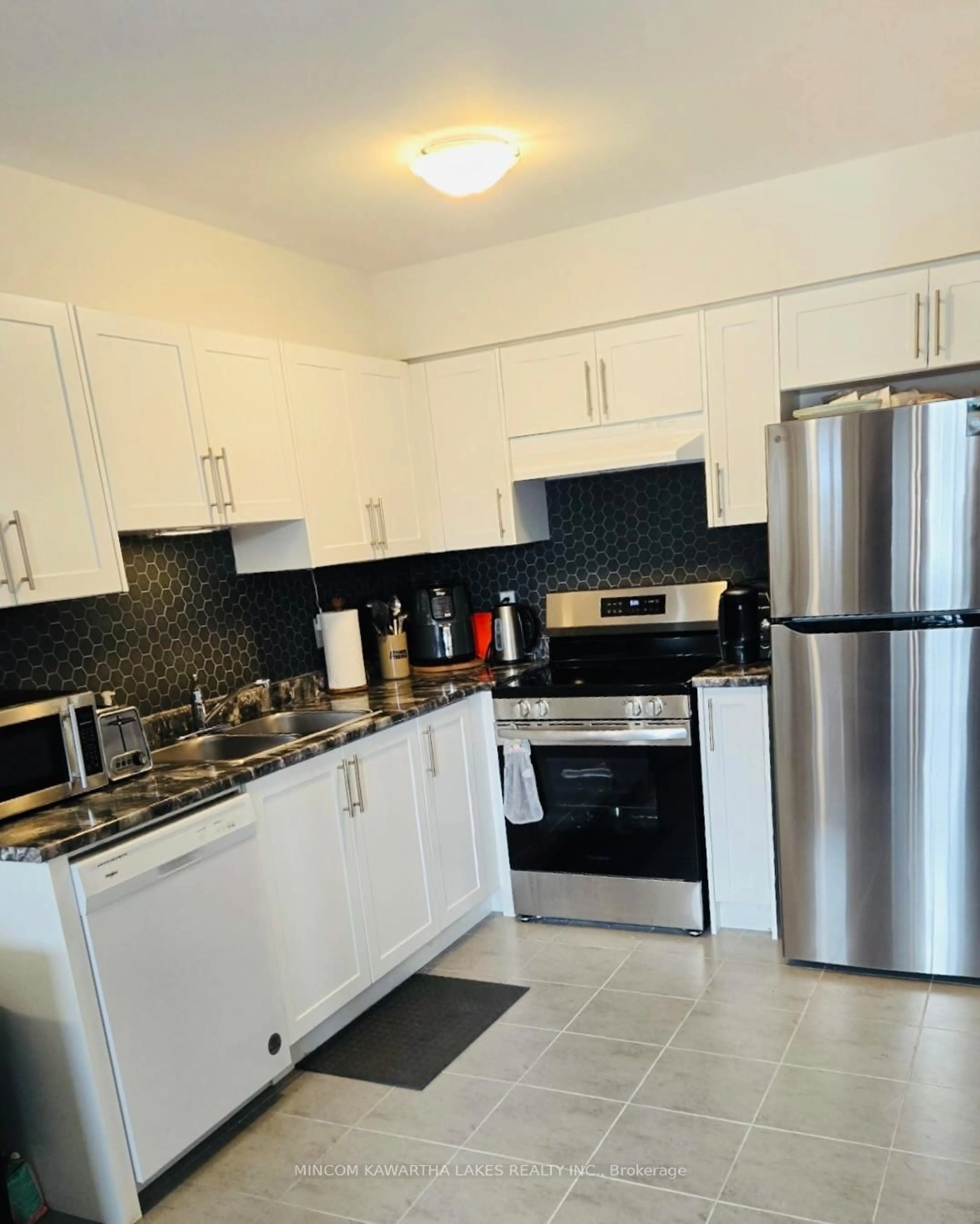 Standard kitchen, ceramic/tile floor for 50 Maple Ave #101, Asphodel-Norwood Ontario K0L 2V0