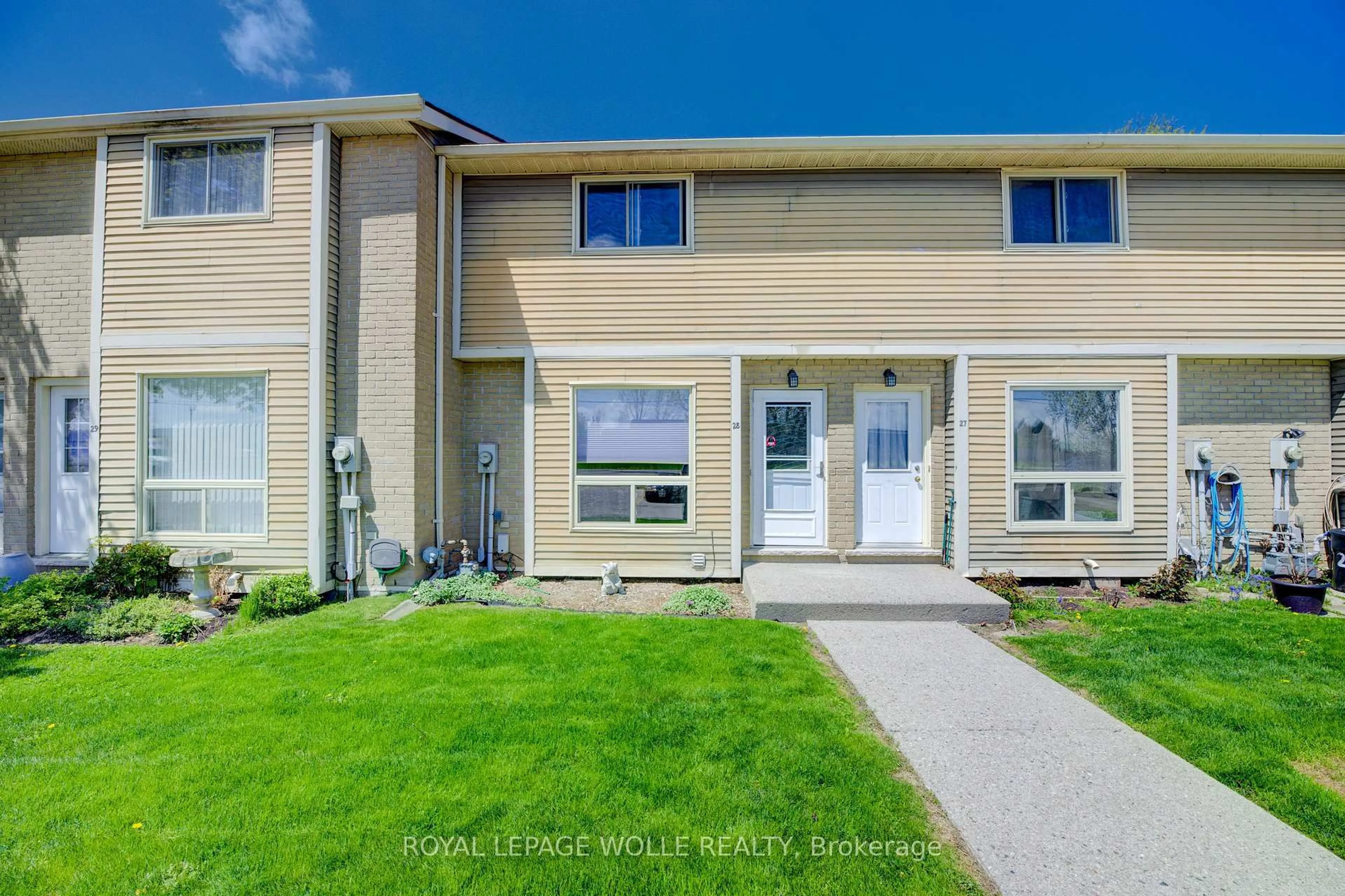 Home with vinyl exterior material, street for 879 Parkinson Rd #28, Woodstock Ontario N4S 8S7
