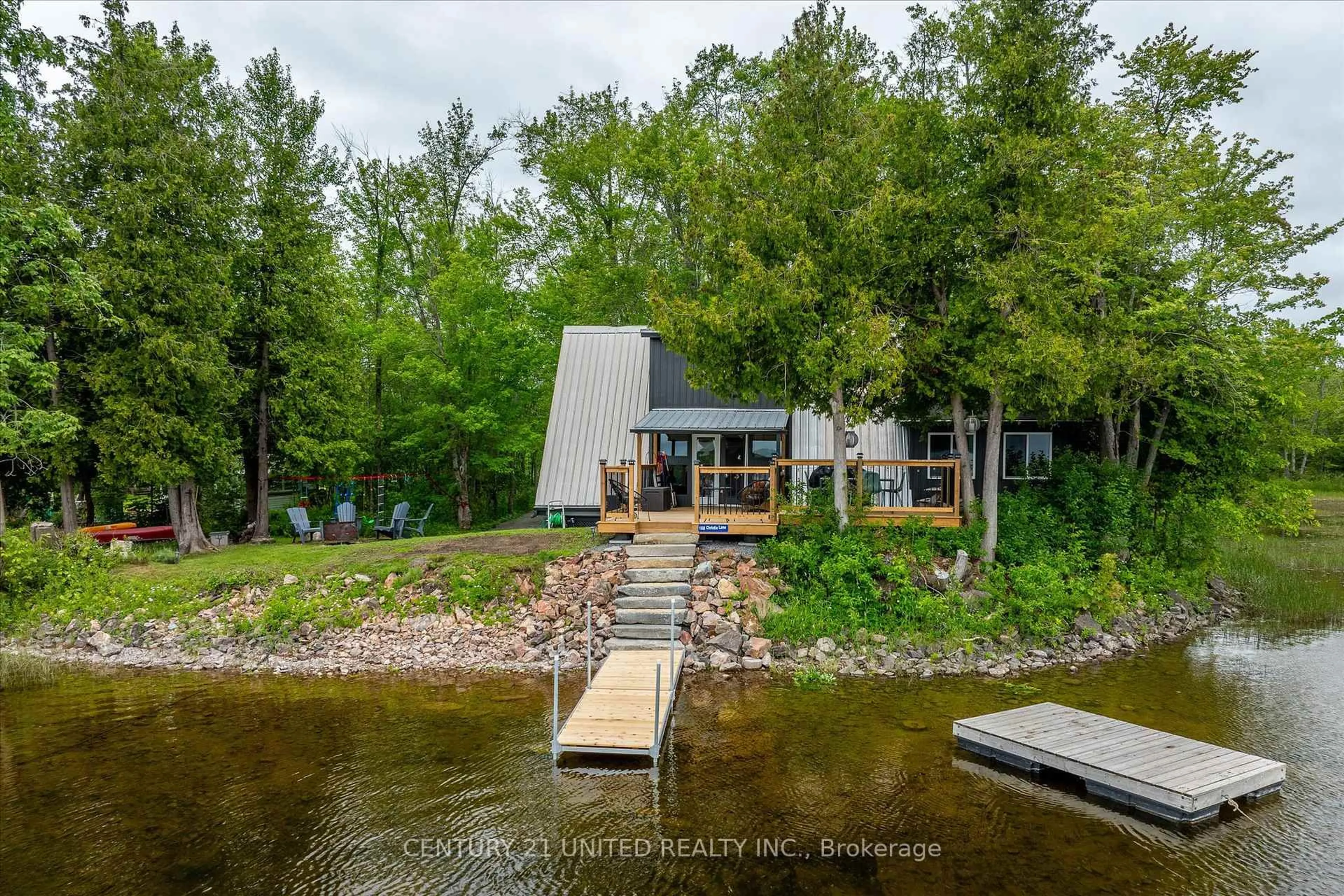 A pic from outside/outdoor area/front of a property/back of a property/a pic from drone, water/lake/river/ocean view for 168 Christie Lane, Madoc Ontario K0K 2K0