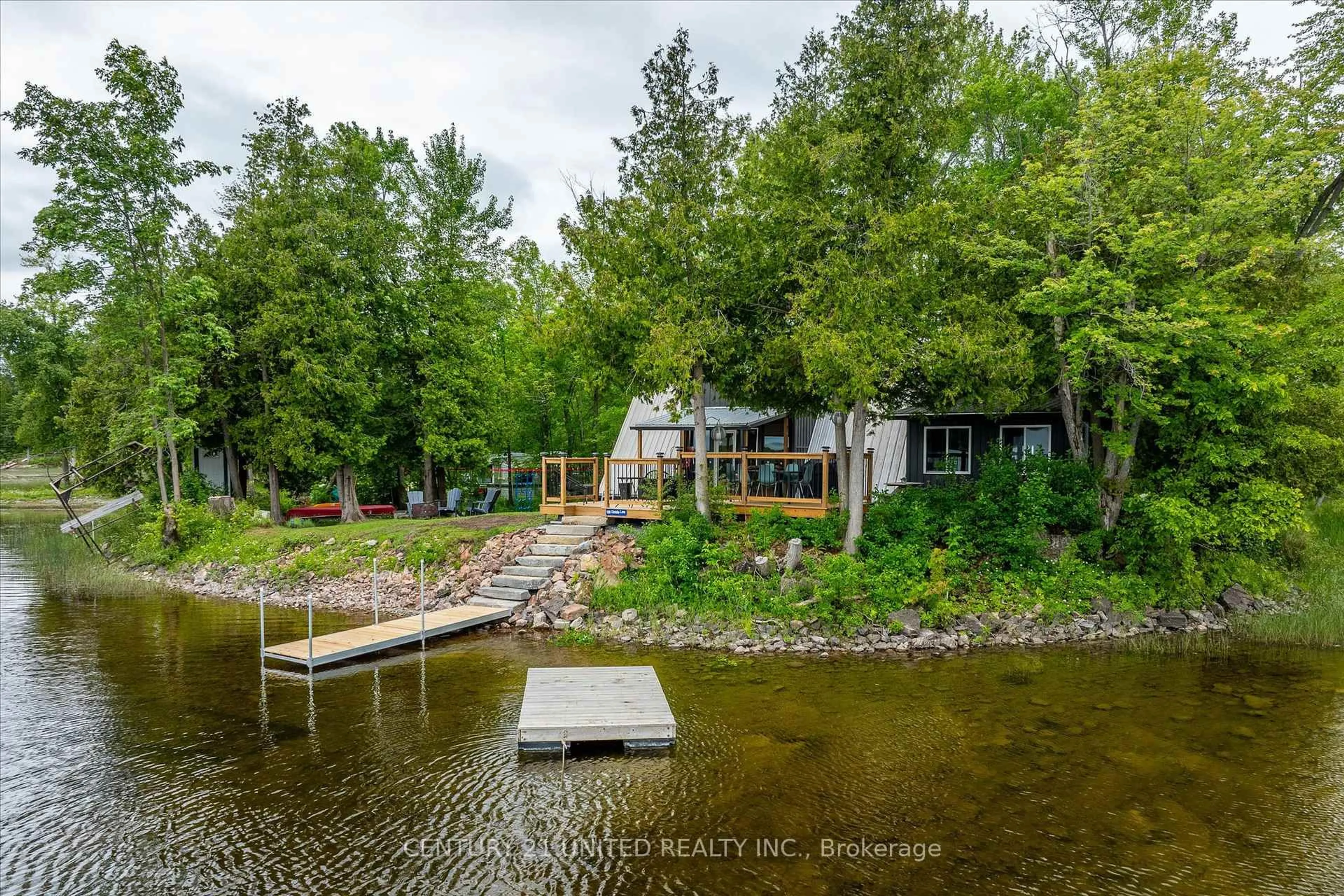 A pic from outside/outdoor area/front of a property/back of a property/a pic from drone, water/lake/river/ocean view for 168 Christie Lane, Madoc Ontario K0K 2K0