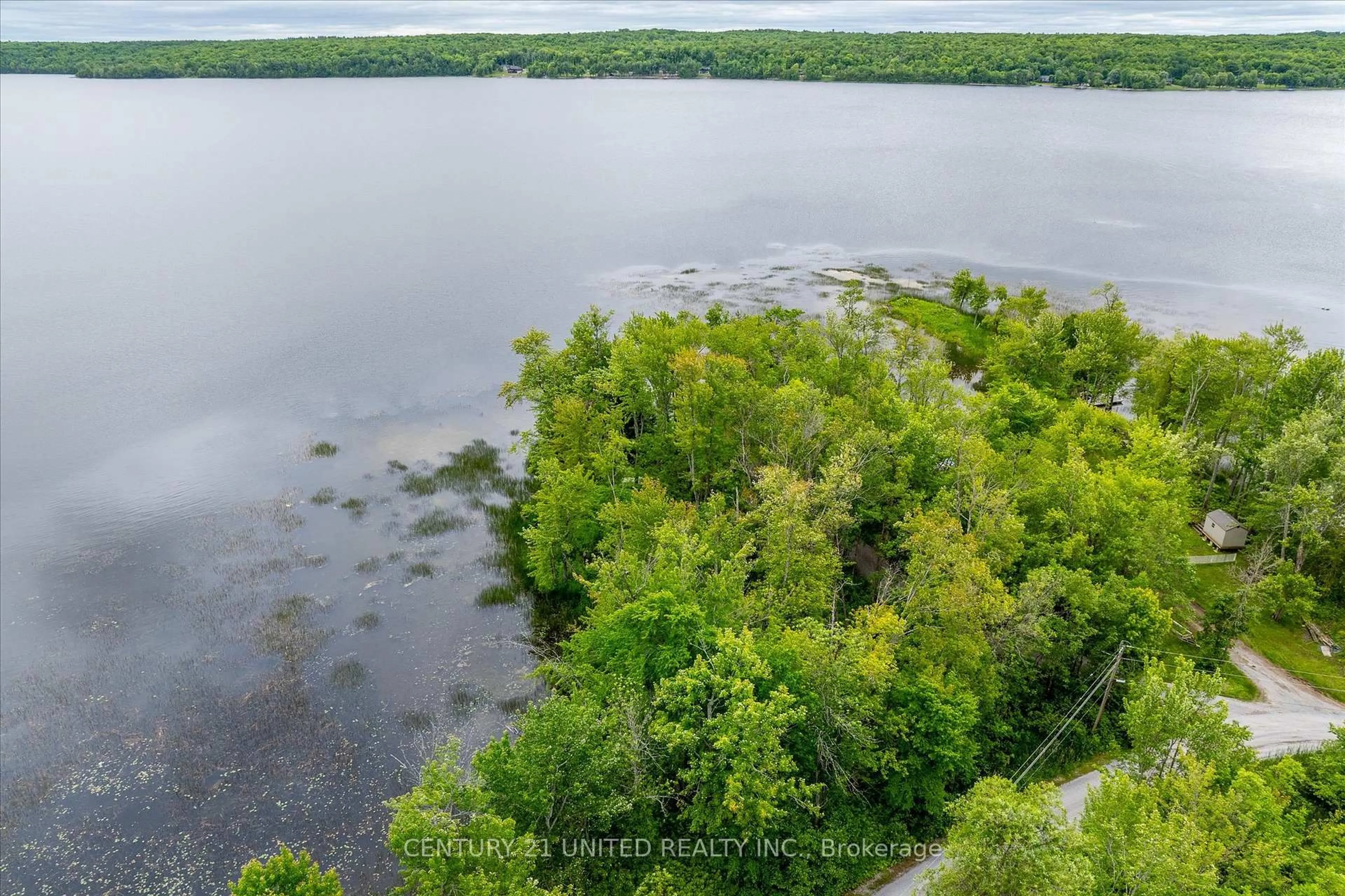 A pic from outside/outdoor area/front of a property/back of a property/a pic from drone, water/lake/river/ocean view for 168 Christie Lane, Madoc Ontario K0K 2K0