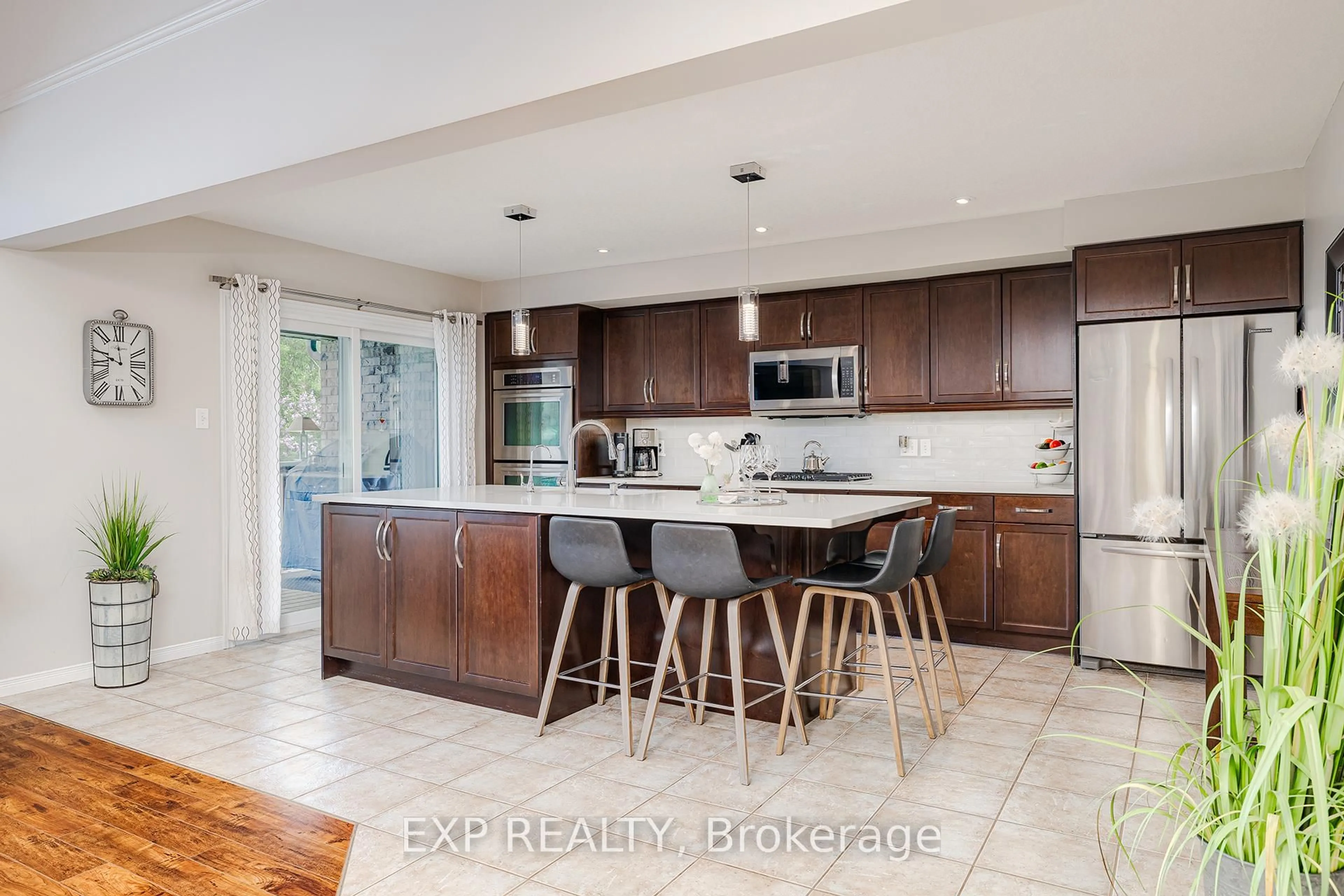 Open concept kitchen, ceramic/tile floor for 31 Townsend Dr #18, Woolwich Ontario N0B 1M0