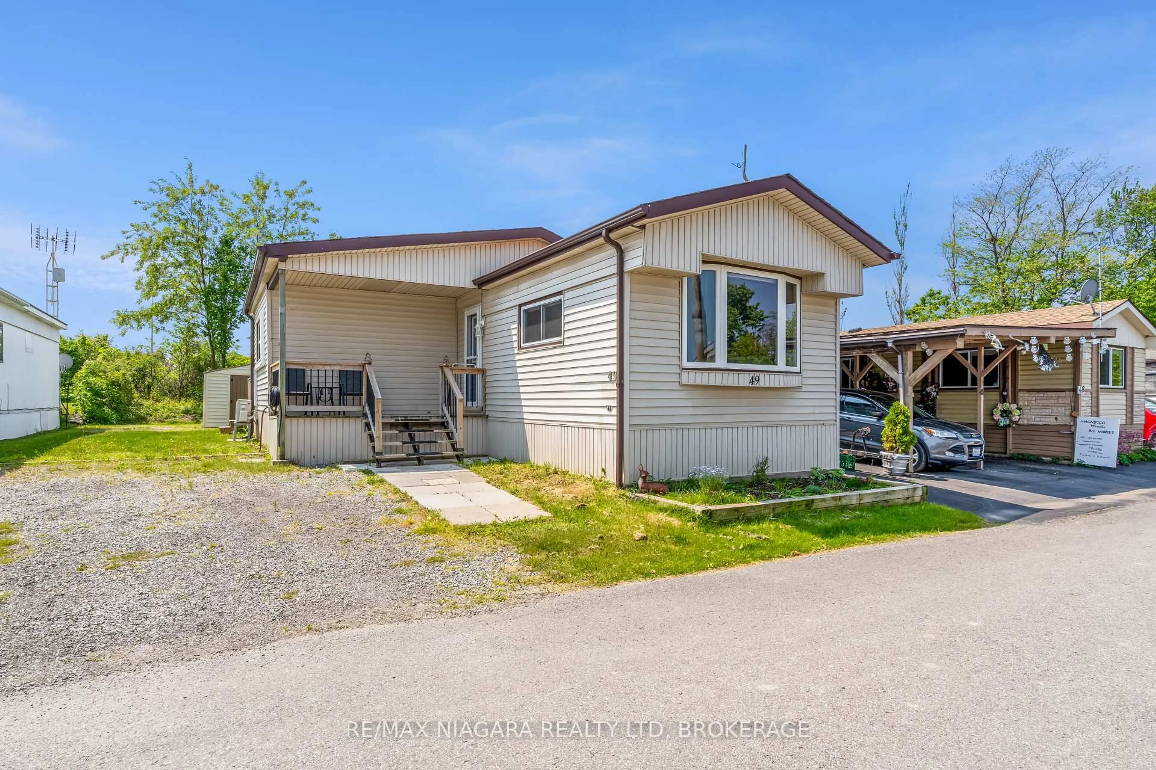 Home with vinyl exterior material, street for 2175 Mewburn Rd #49, Niagara Falls Ontario L2J 0A6