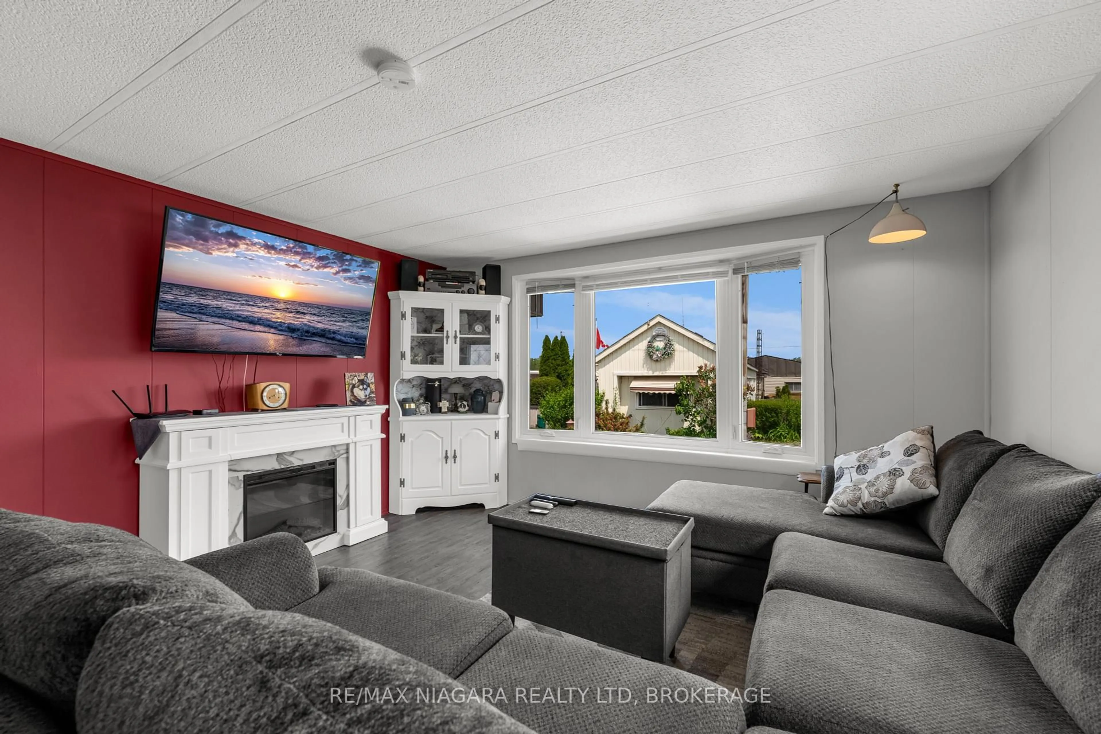 Living room with furniture, unknown for 2175 Mewburn Rd #49, Niagara Falls Ontario L2J 0A6