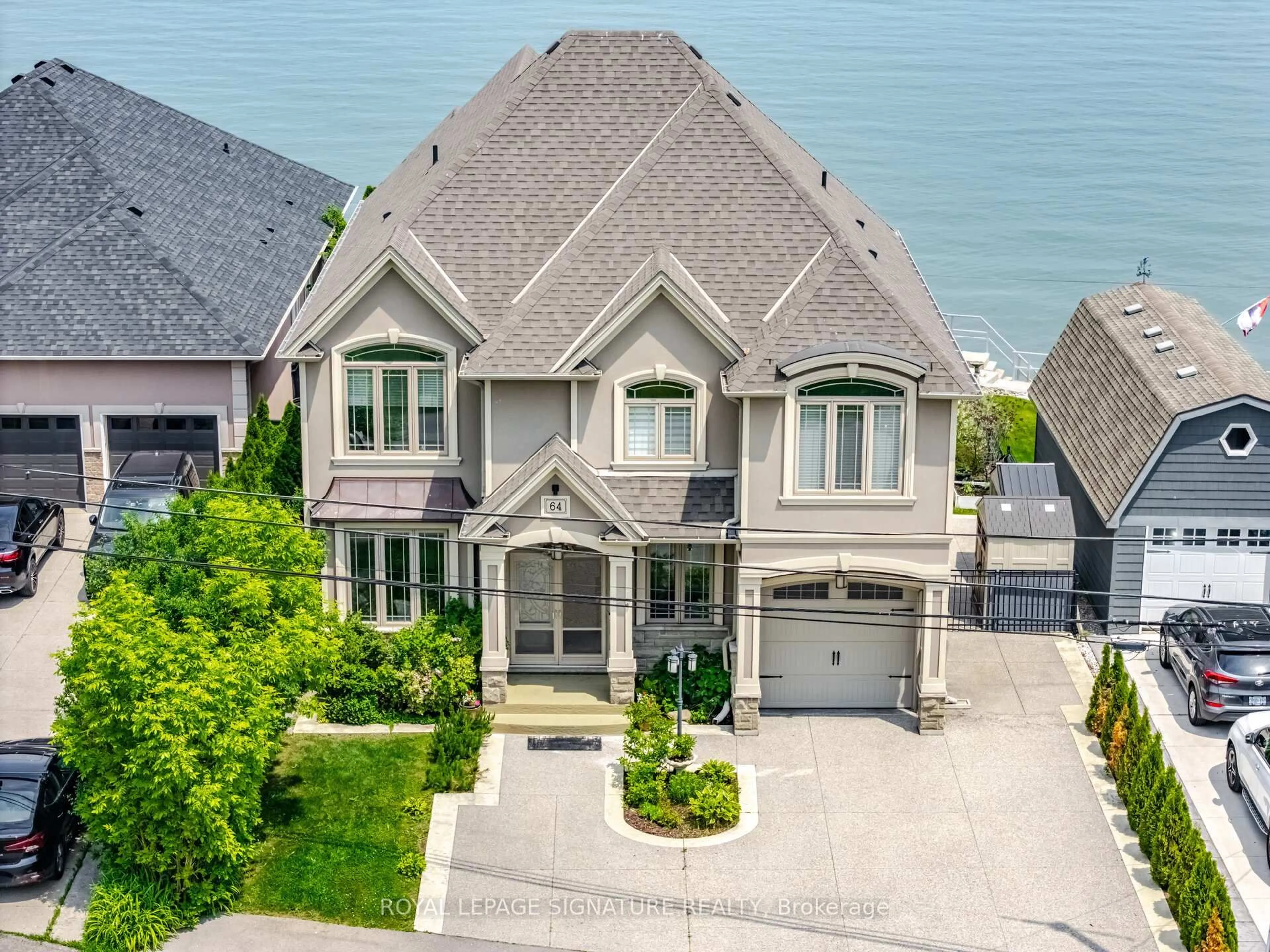 A pic from outside/outdoor area/front of a property/back of a property/a pic from drone, water/lake/river/ocean view for 64 Seabreeze Cres, Hamilton Ontario L8E 5C9