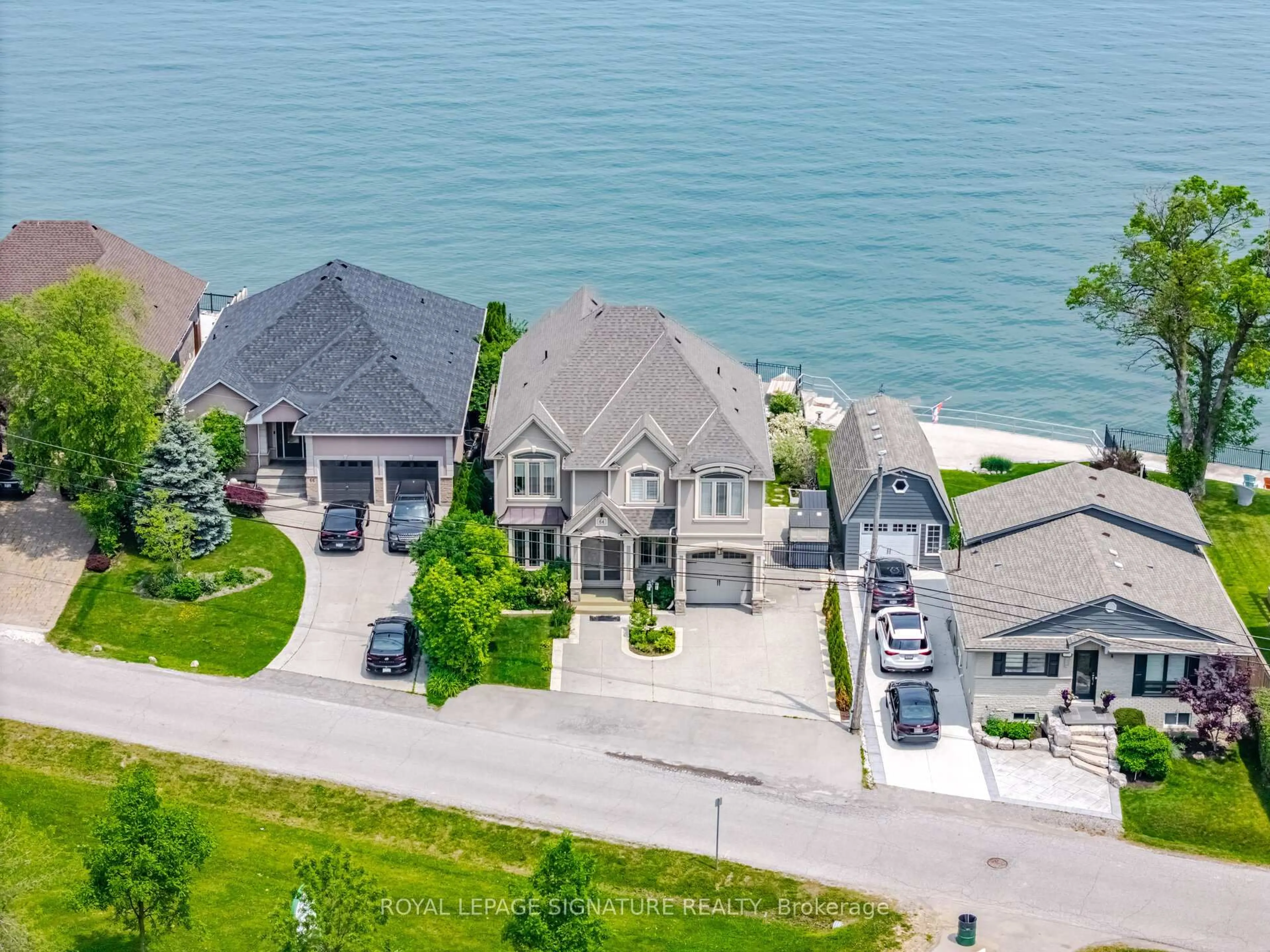 A pic from outside/outdoor area/front of a property/back of a property/a pic from drone, water/lake/river/ocean view for 64 Seabreeze Cres, Hamilton Ontario L8E 5C9
