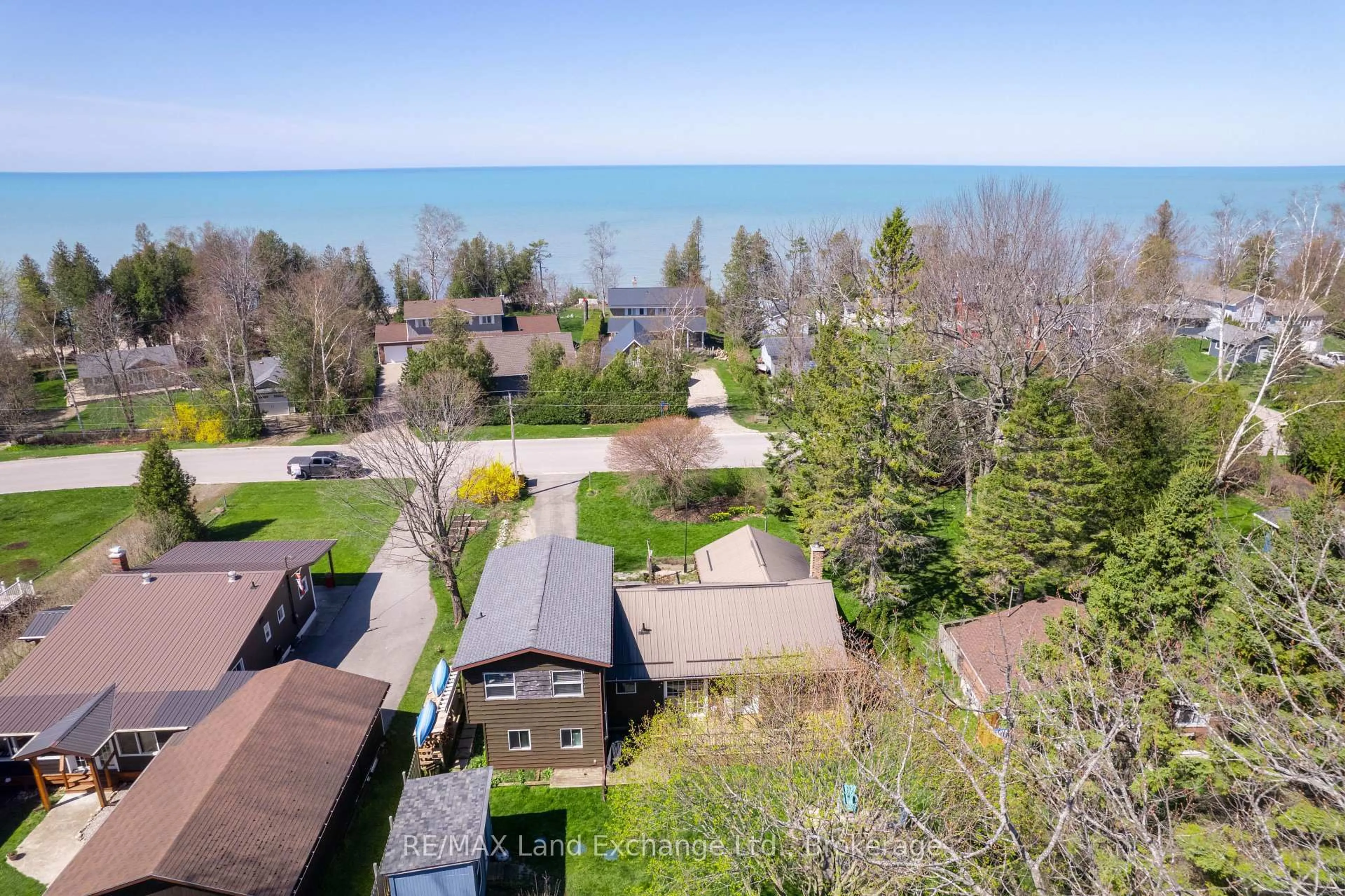 A pic from outside/outdoor area/front of a property/back of a property/a pic from drone, water/lake/river/ocean view for 180 Huron Rd, Huron-Kinloss Ontario N2Z 2X3