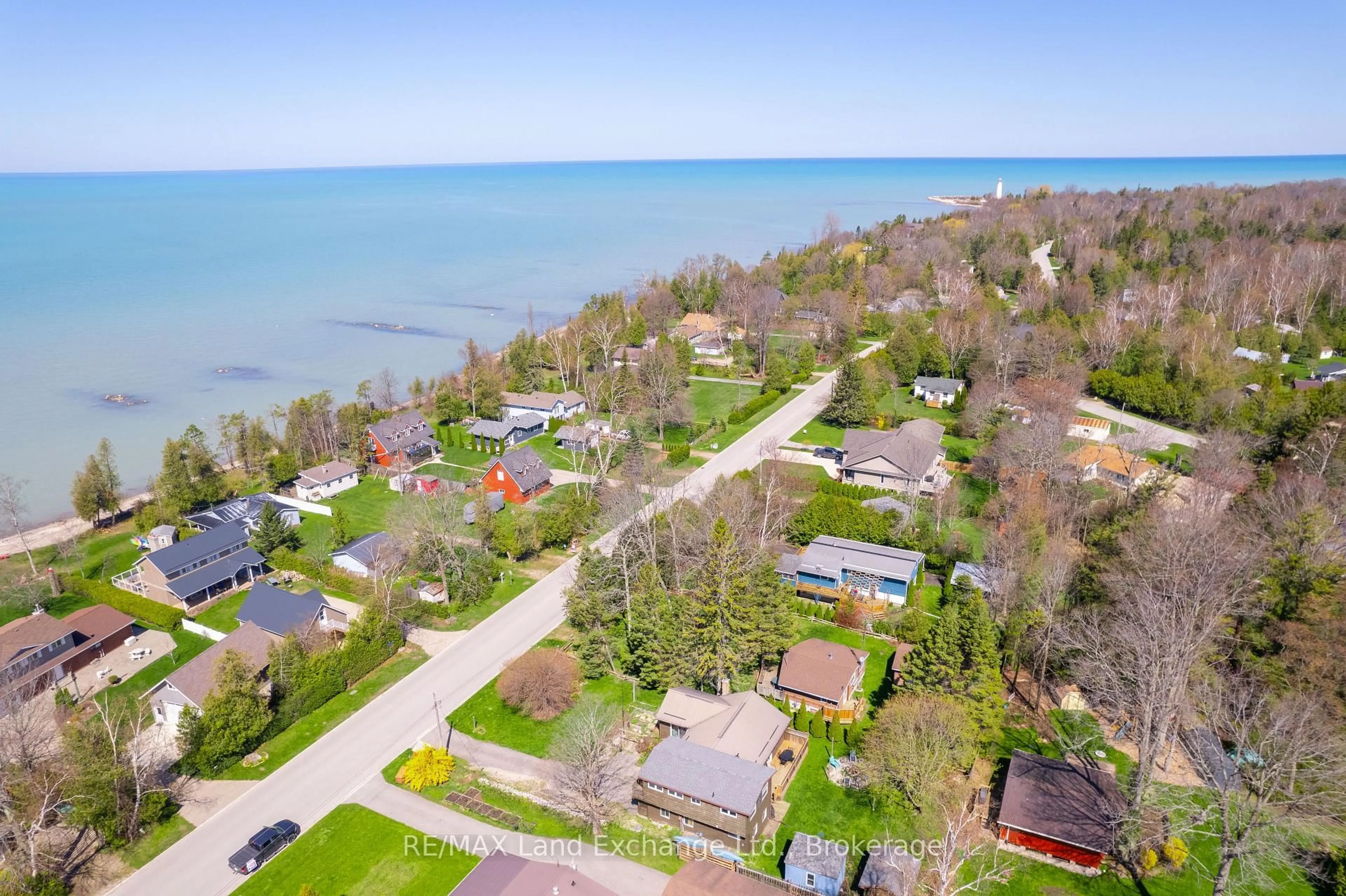 A pic from outside/outdoor area/front of a property/back of a property/a pic from drone, water/lake/river/ocean view for 180 Huron Rd, Huron-Kinloss Ontario N2Z 2X3