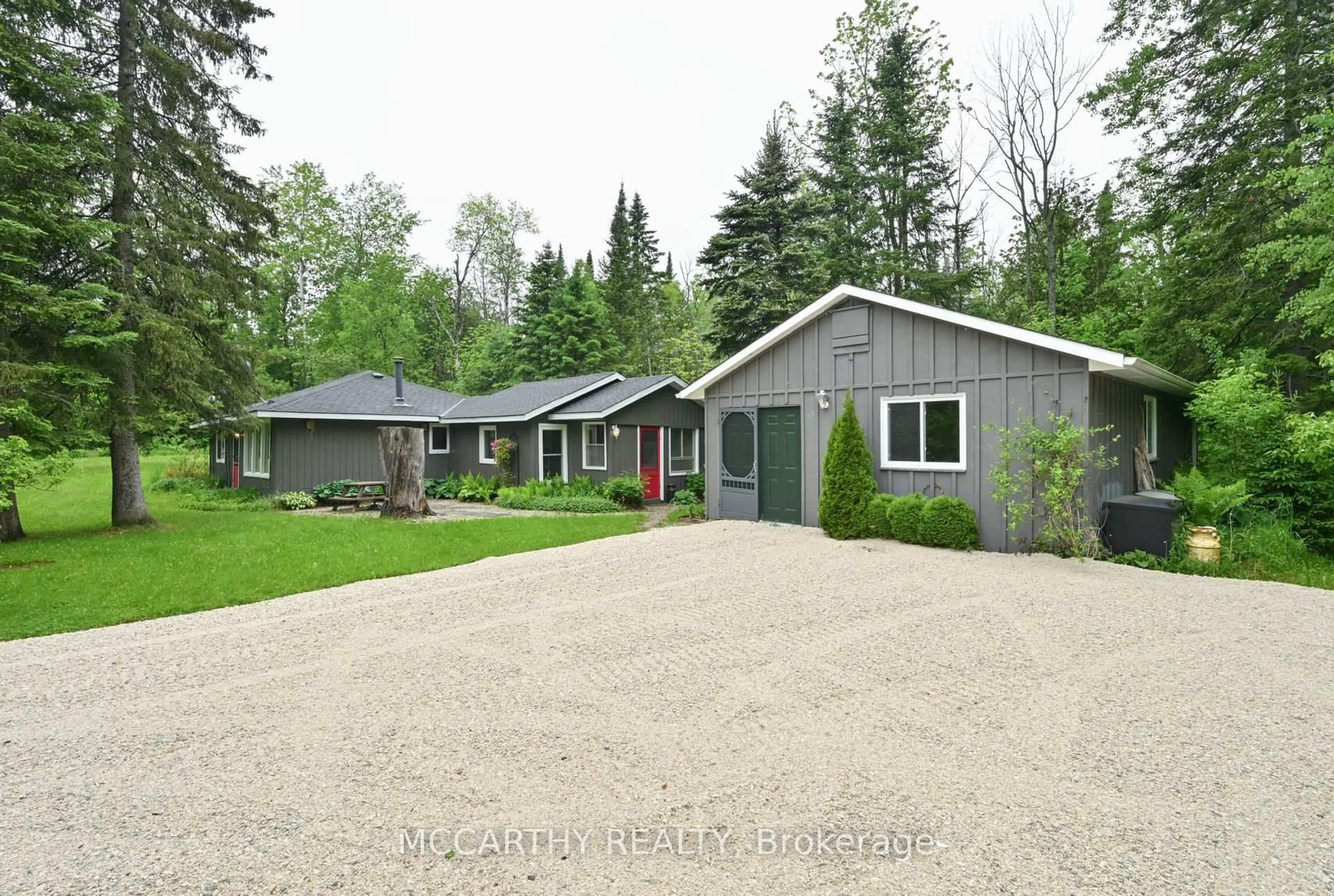 A pic from outside/outdoor area/front of a property/back of a property/a pic from drone, street for 606095 River Rd, Mulmur Ontario L9V 0S9