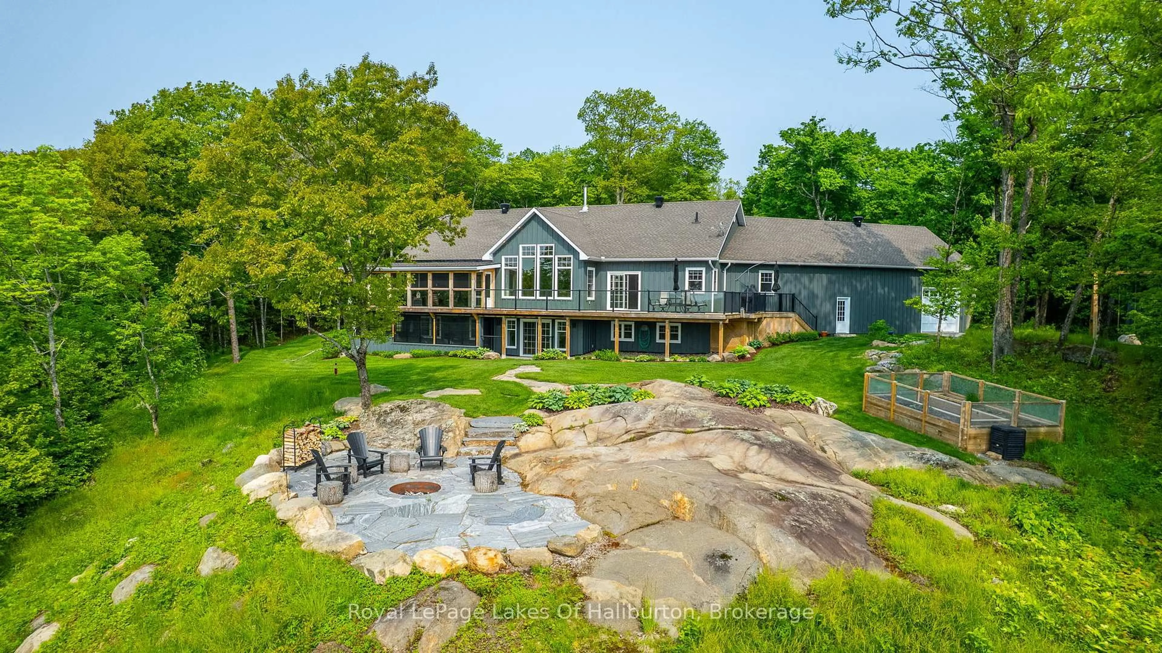 A pic from outside/outdoor area/front of a property/back of a property/a pic from drone, water/lake/river/ocean view for 1143 Trillium Tr, Dysart et al Ontario K0M 1S0
