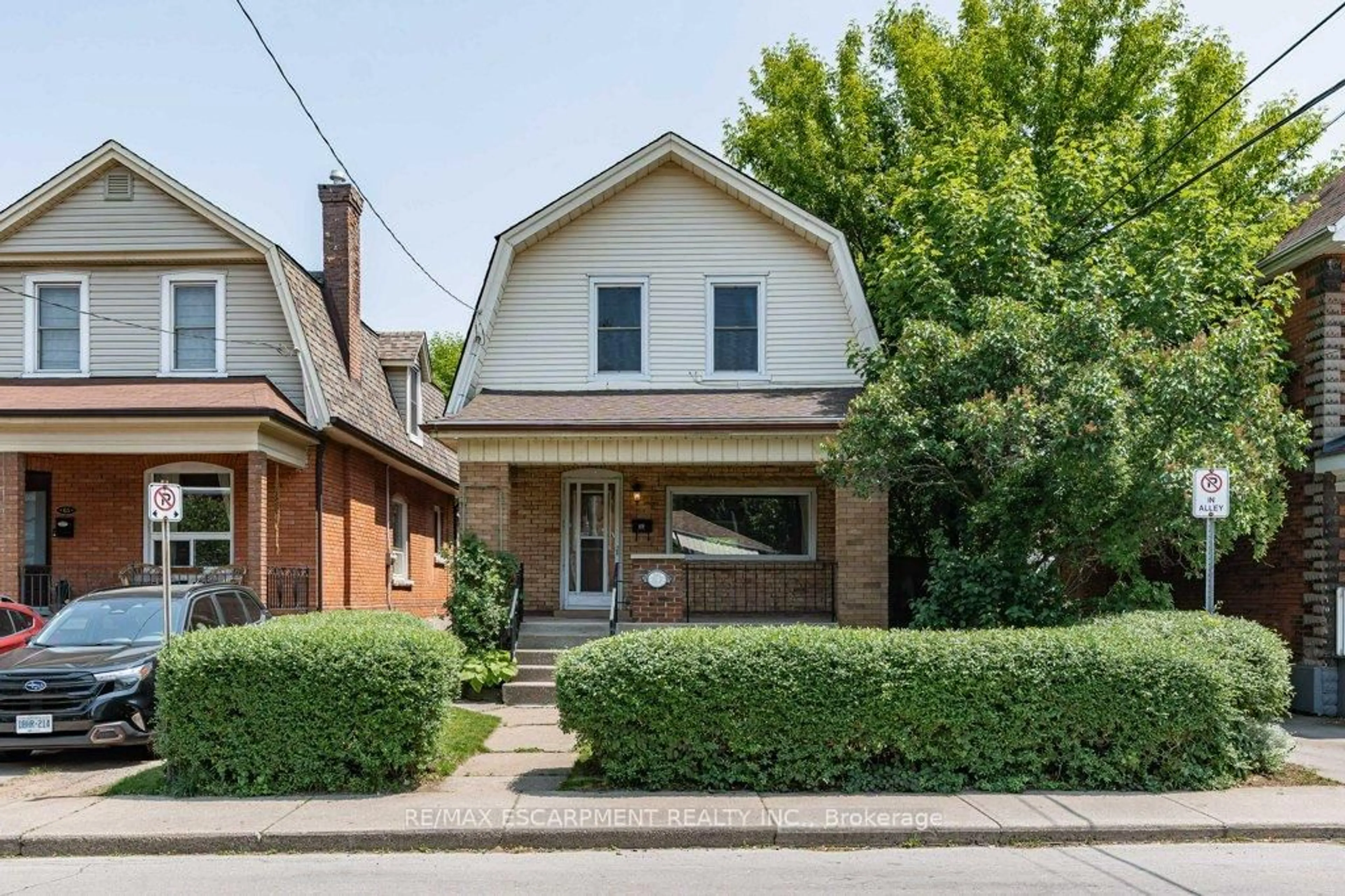 Home with brick exterior material, street for 69 Lorne Ave, Hamilton Ontario L8M 2X7