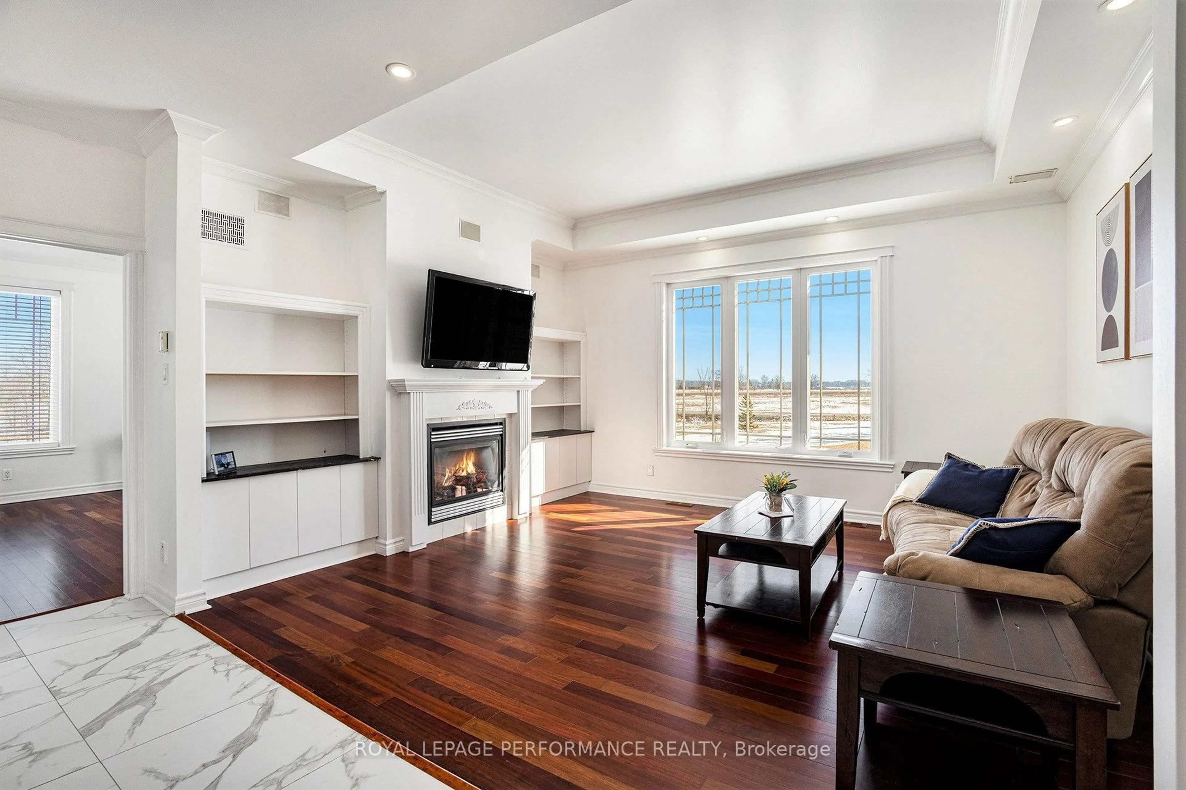 Living room with furniture, wood/laminate floor for 117 Route 25 Rte, Alfred and Plantagenet Ontario K0A 3K0