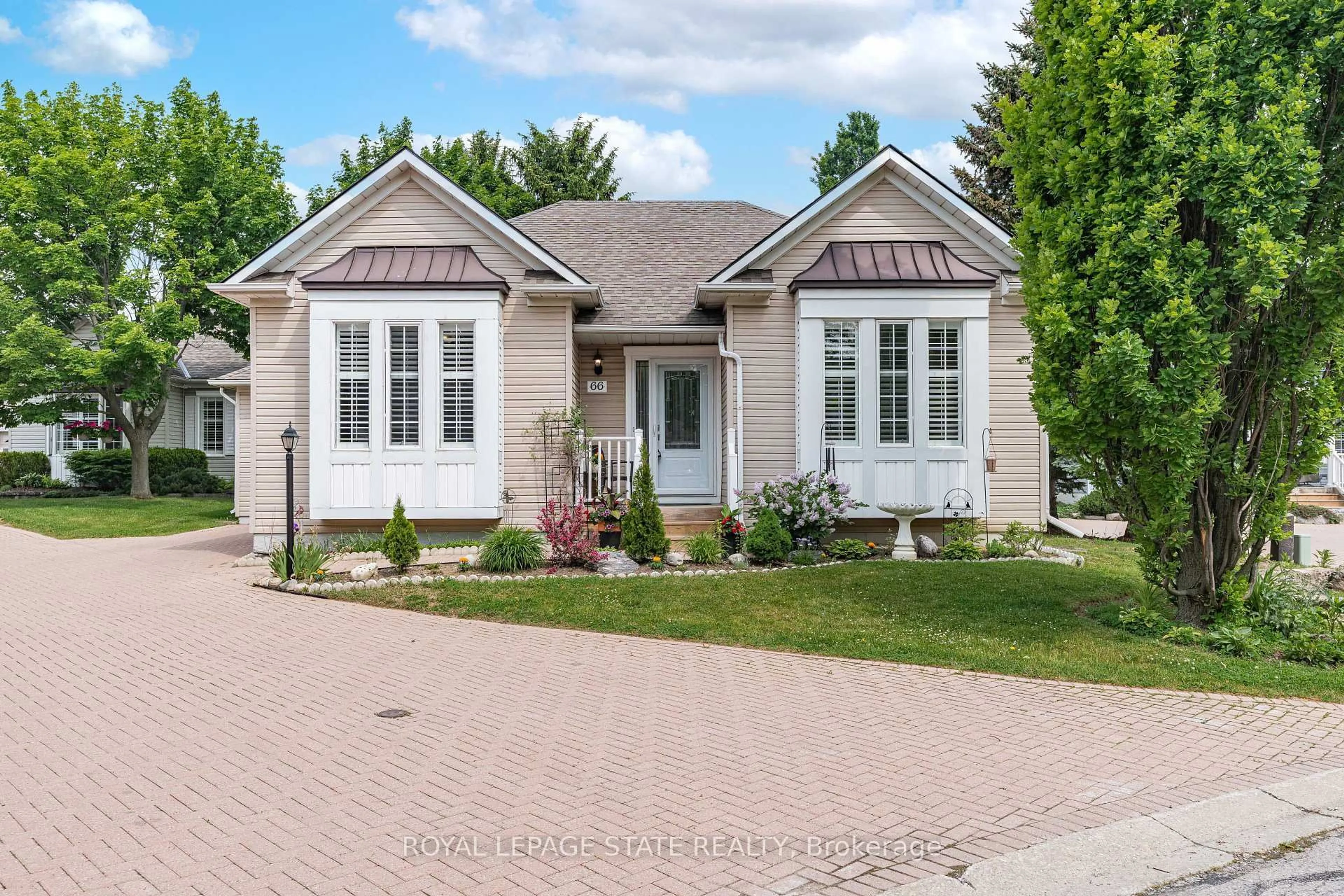 Home with brick exterior material, street for 66 Silverbirch Blvd, Hamilton Ontario L0R 1W0