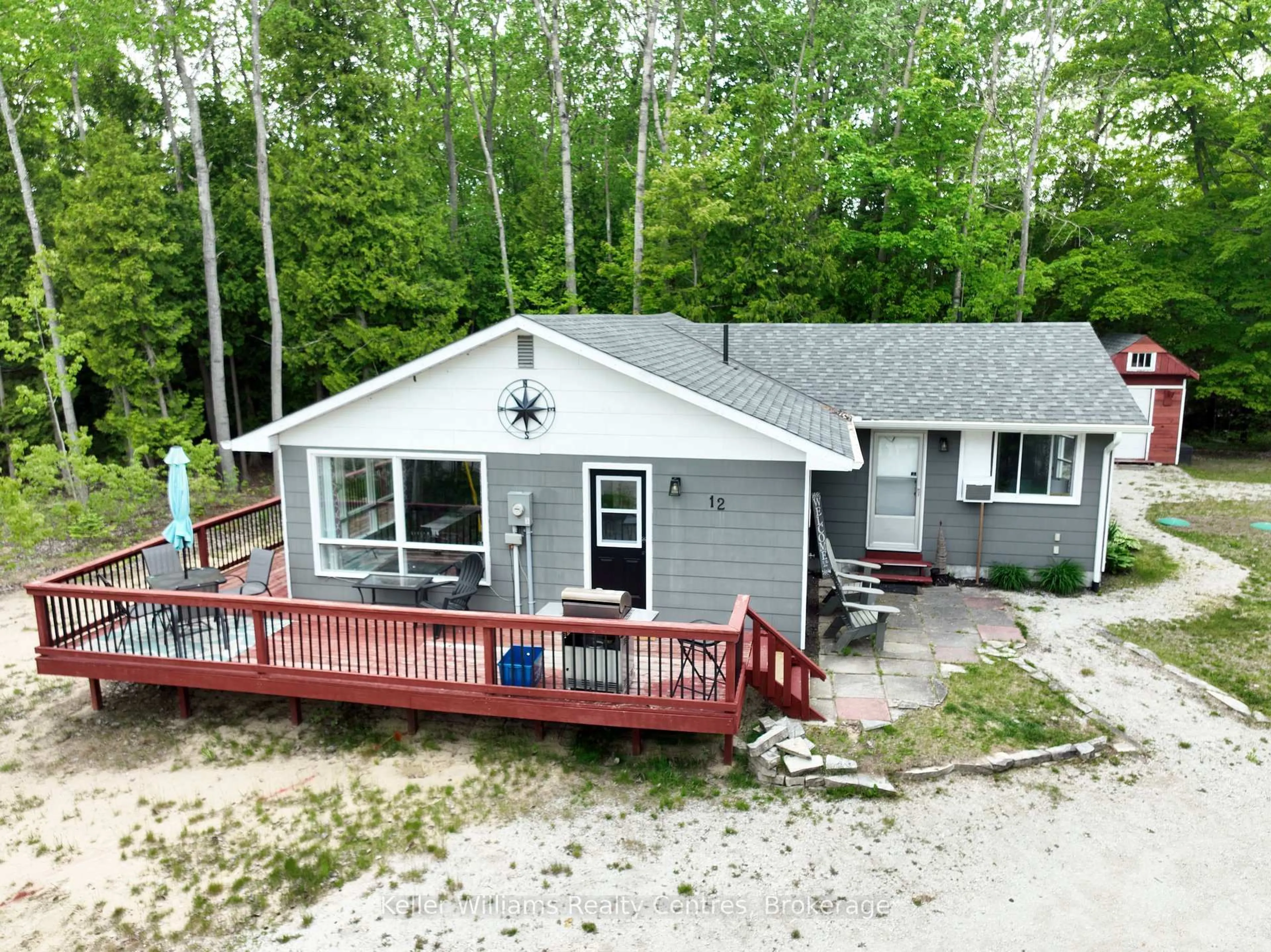 A pic from outside/outdoor area/front of a property/back of a property/a pic from drone, unknown for 12 Pierce St, South Bruce Peninsula Ontario N0H 2T0