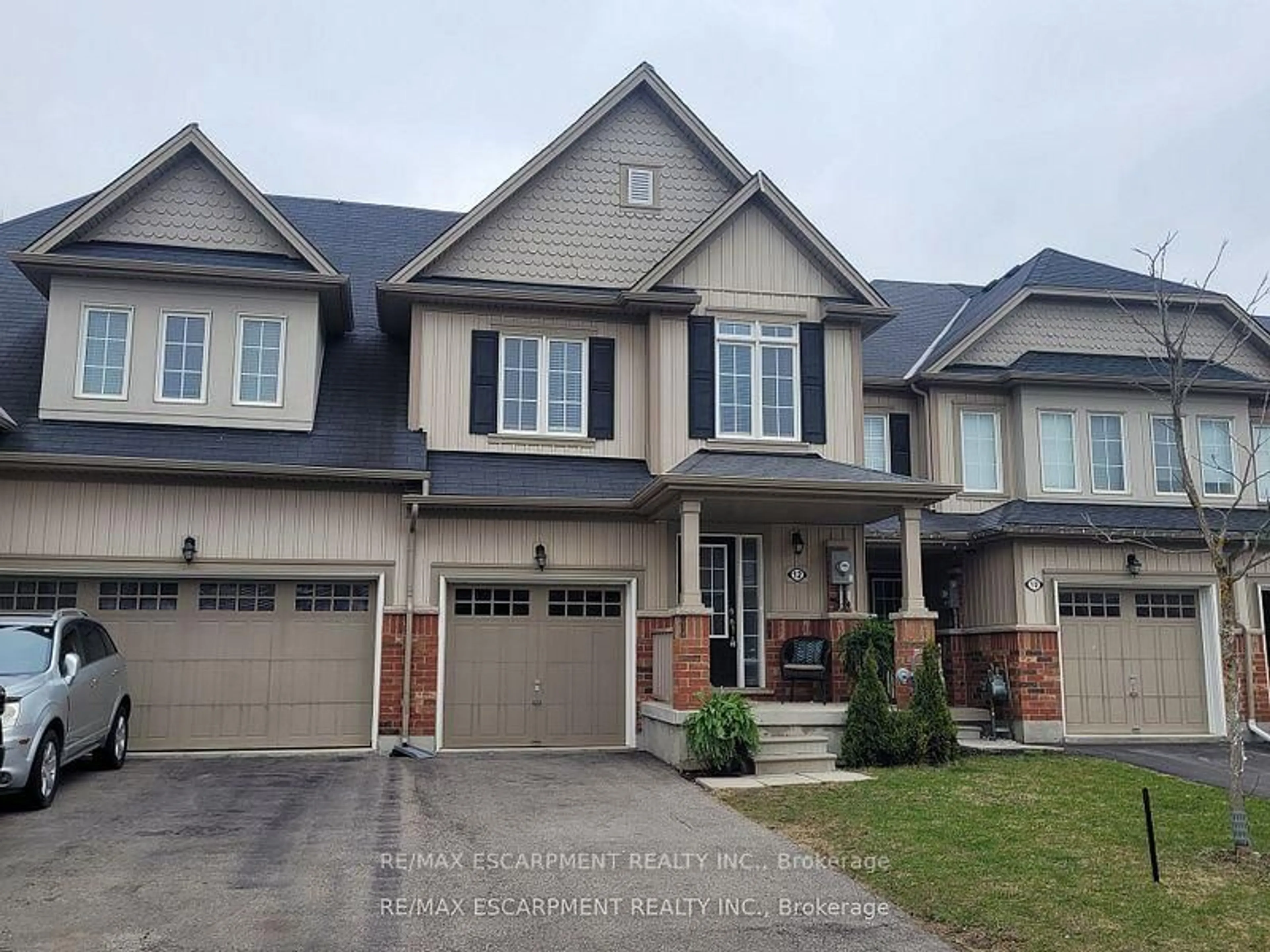 Home with brick exterior material, street for 12 Lynch Cres, Hamilton Ontario L3W 1G8