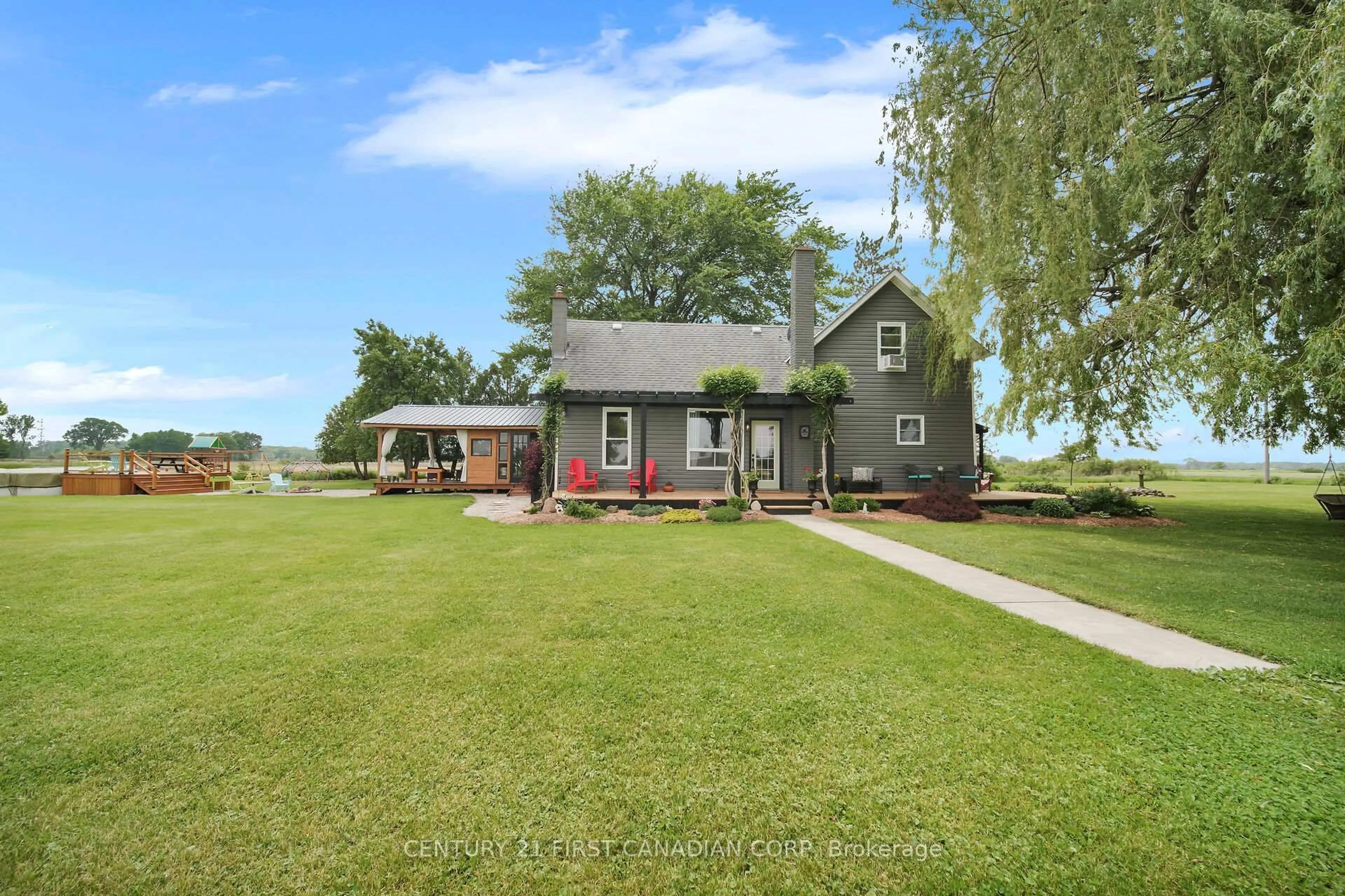 A pic from outside/outdoor area/front of a property/back of a property/a pic from drone, water/lake/river/ocean view for 24631 Stalker Line, West Elgin Ontario N0L 2P0