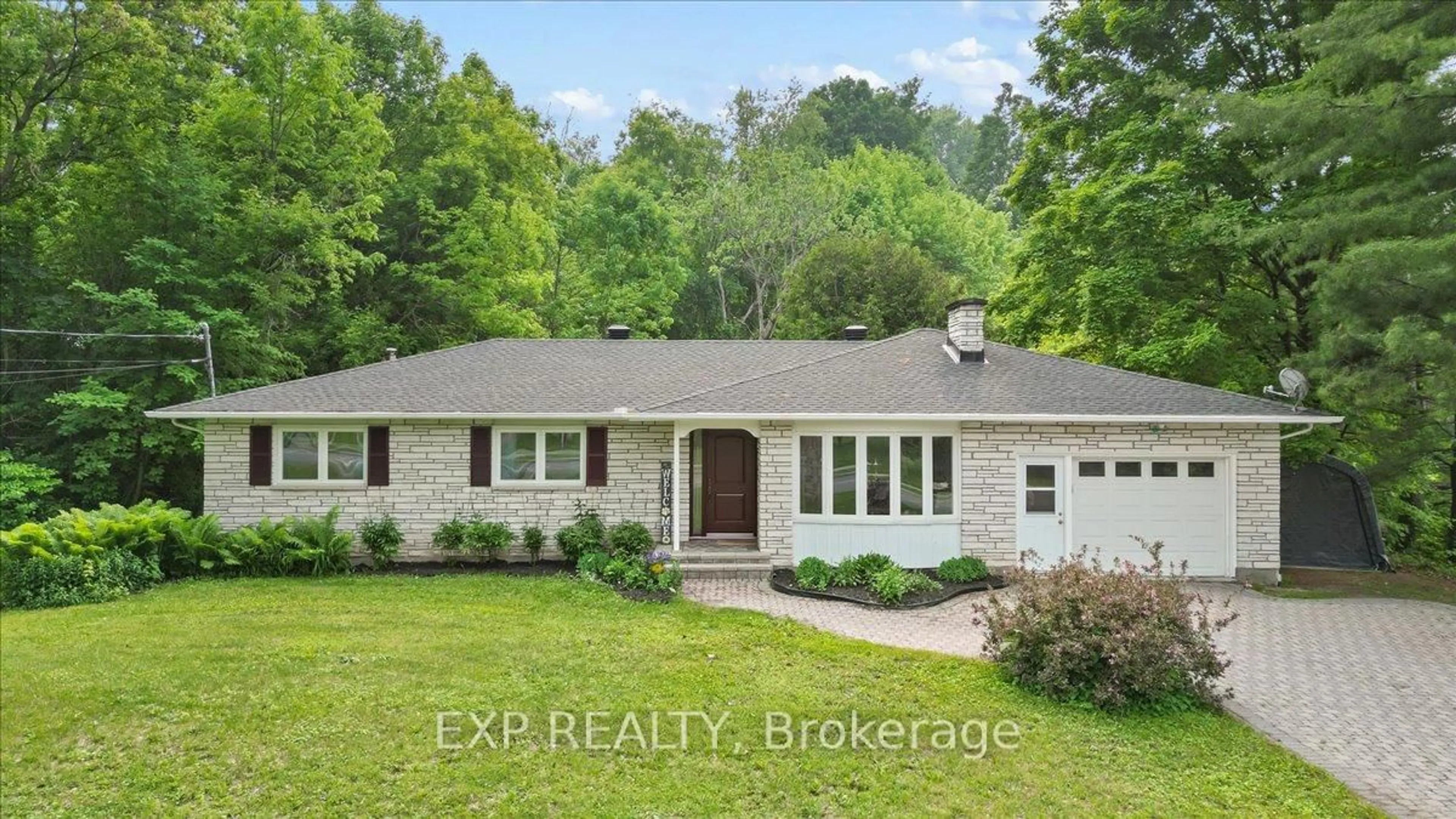 Home with brick exterior material, street for 1106 Dunning Rd, Orleans Ontario K4C 1P5