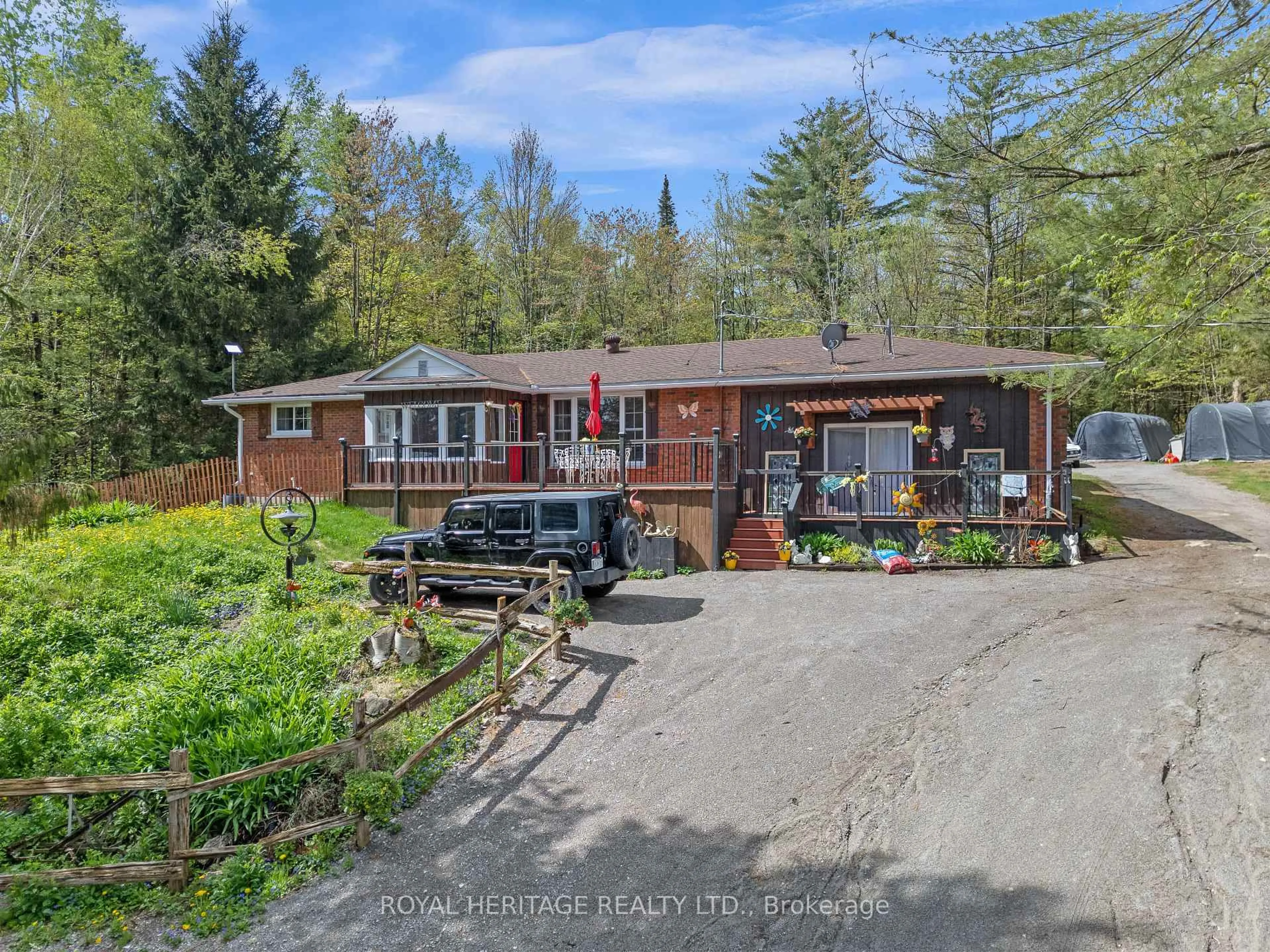 A pic from outside/outdoor area/front of a property/back of a property/a pic from drone, water/lake/river/ocean view for 26 Reid St, Trent Lakes Ontario K0M 2A0