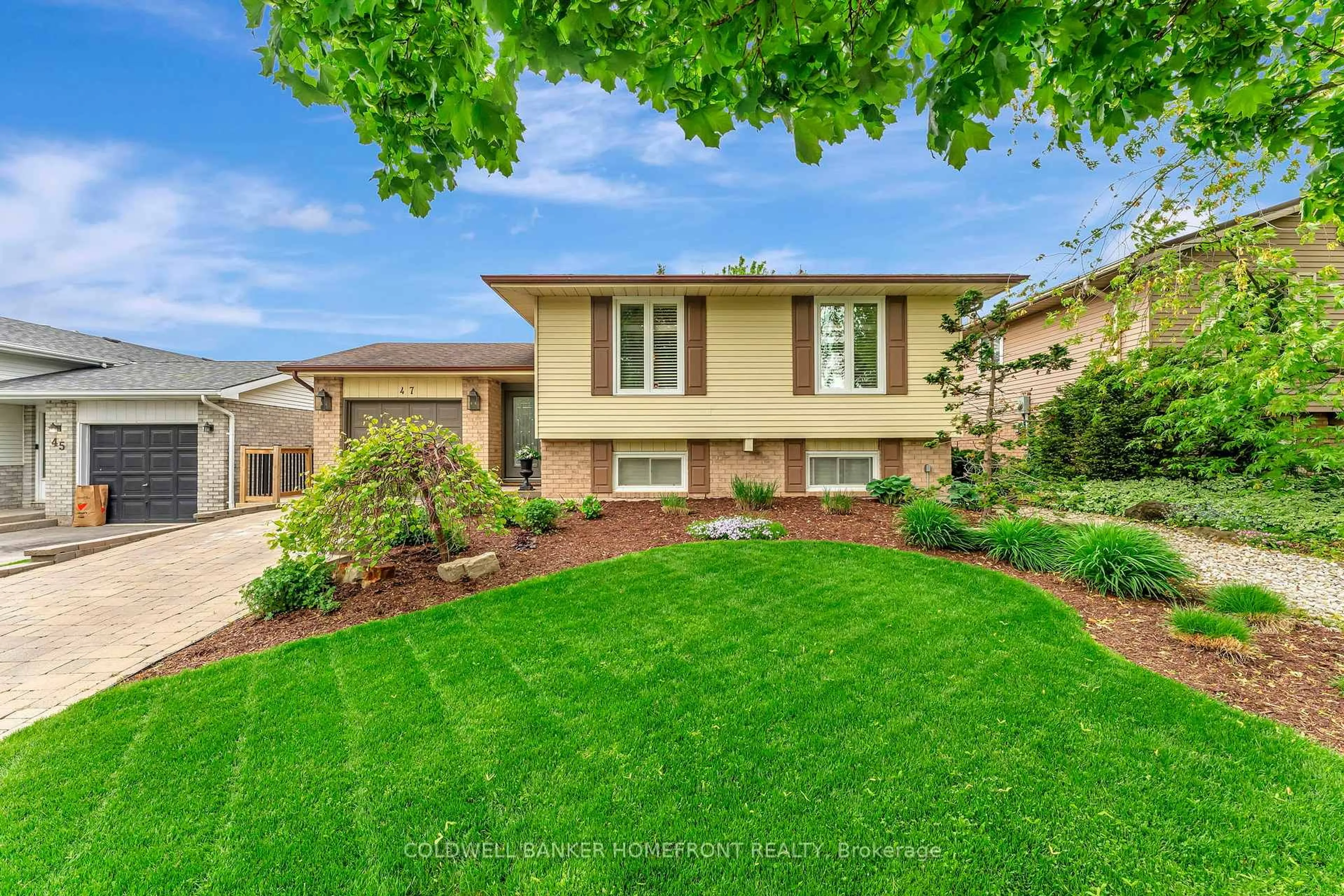 Home with vinyl exterior material, street for 47 Myrtleville Dr, Brantford Ontario N3V 1C1