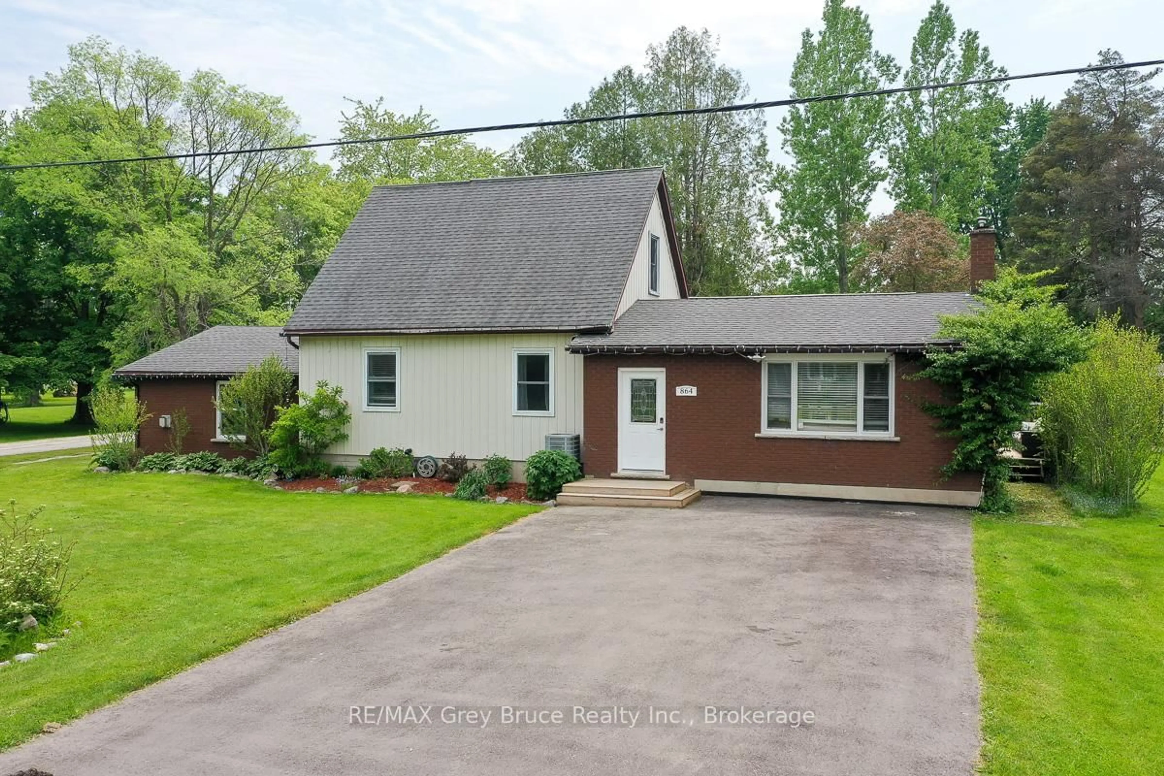 Home with brick exterior material, street for 864 16th St, Georgian Bluffs Ontario N4K 6V5