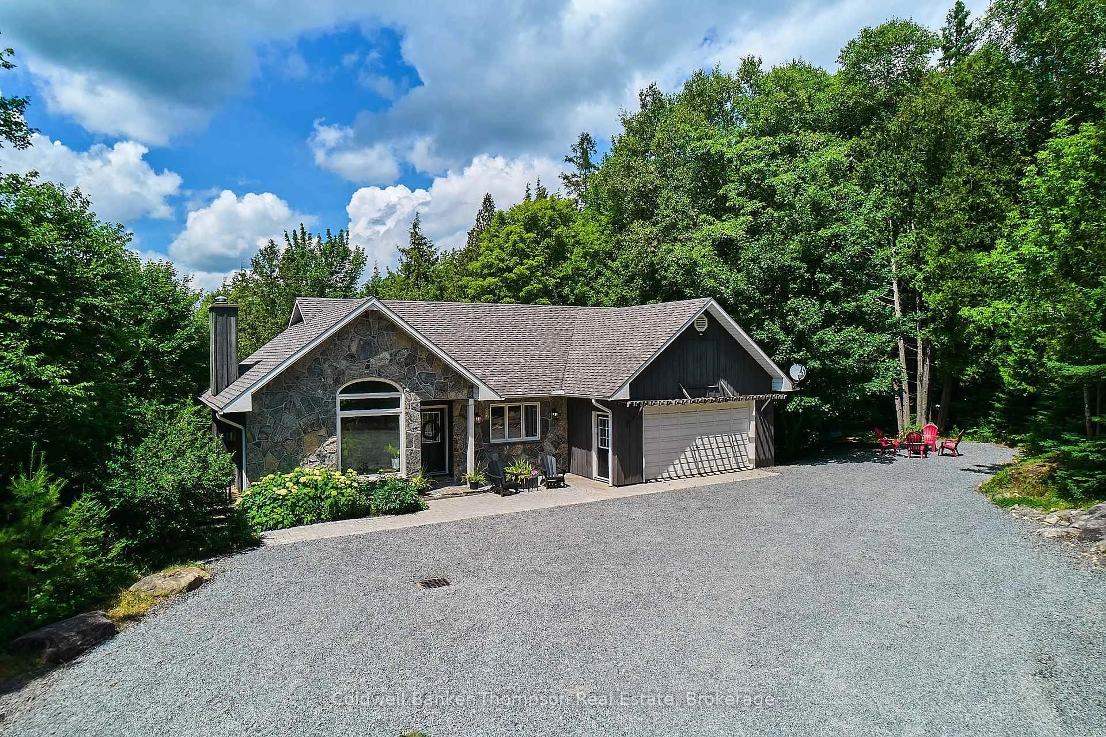 A pic from outside/outdoor area/front of a property/back of a property/a pic from drone, unknown for 440 CHUB LAKE Rd, Huntsville Ontario P1H 2J3