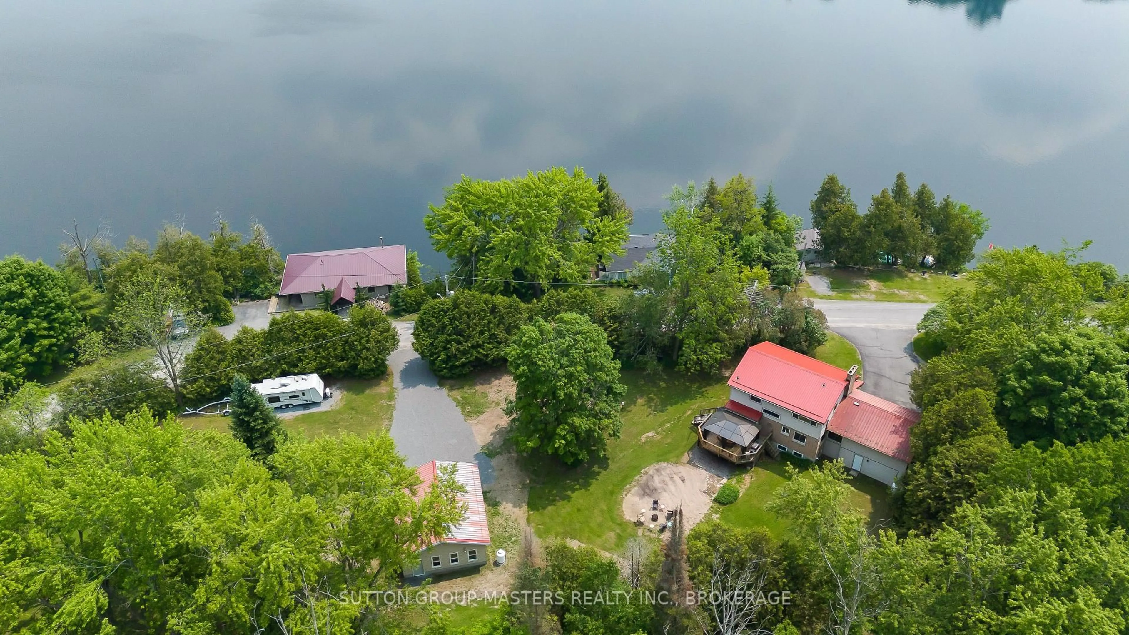 A pic from outside/outdoor area/front of a property/back of a property/a pic from drone, water/lake/river/ocean view for 4667 CLEARWATER Rd, Sydenham Ontario K0H 2T0
