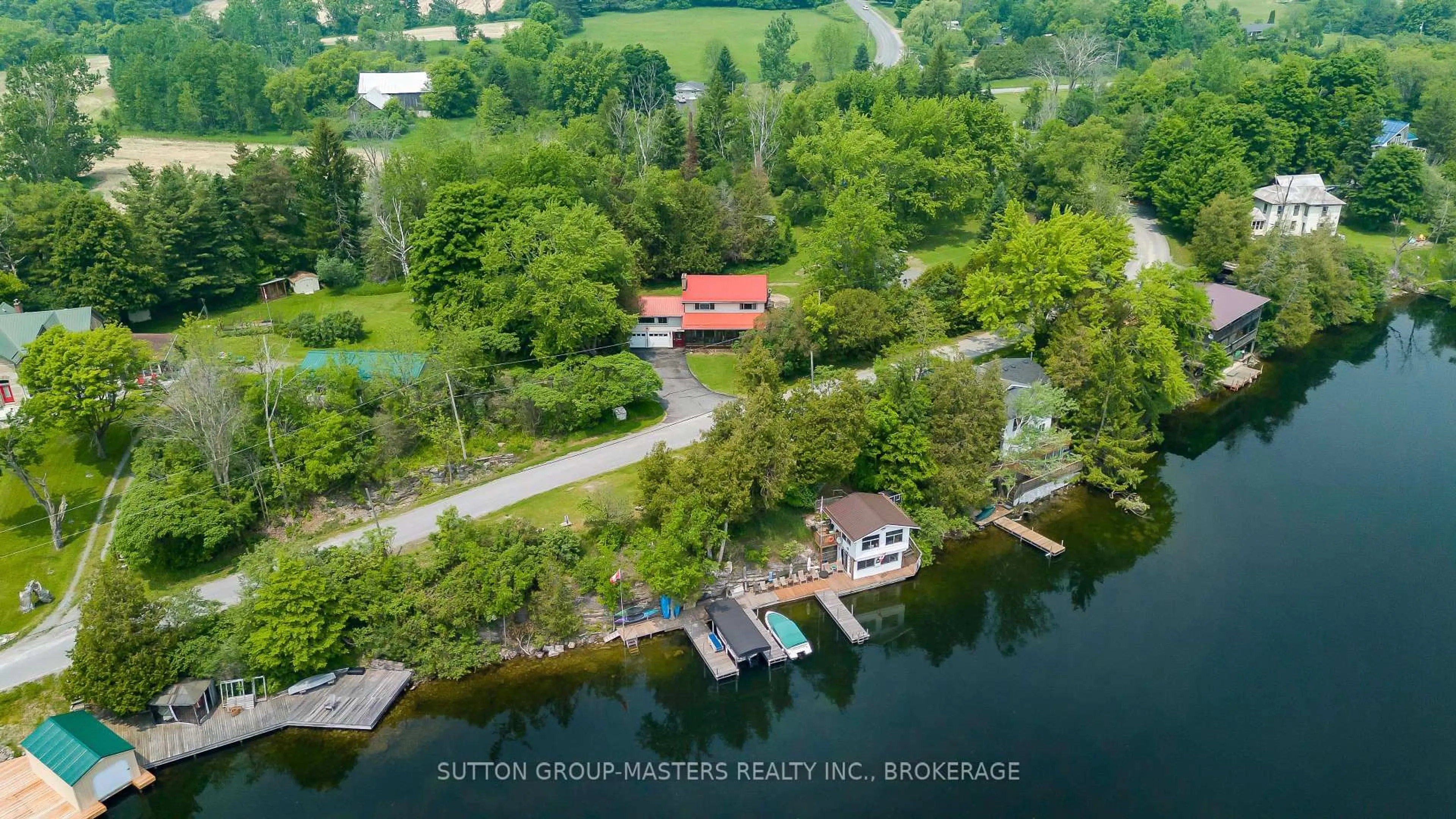 A pic from outside/outdoor area/front of a property/back of a property/a pic from drone, water/lake/river/ocean view for 4667 CLEARWATER Rd, Sydenham Ontario K0H 2T0