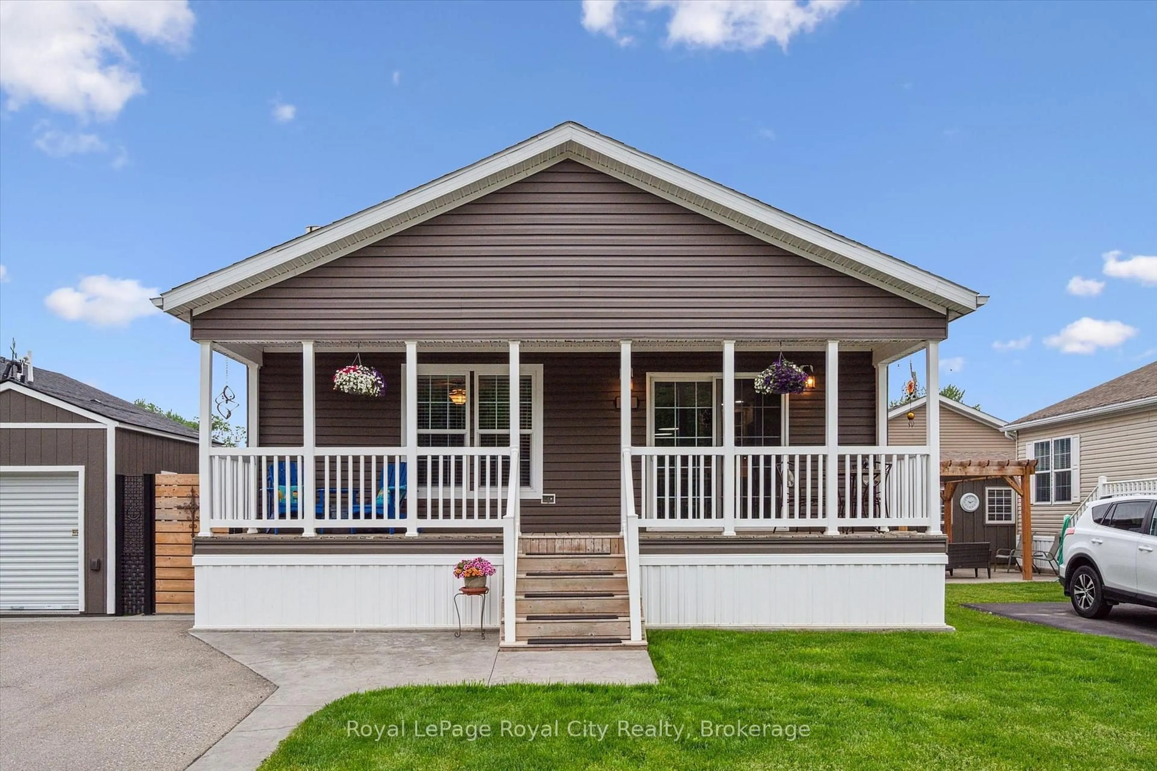 Home with vinyl exterior material, street for 13 Basswood Road Pvt Rd, Puslinch Ontario N0B 2J0