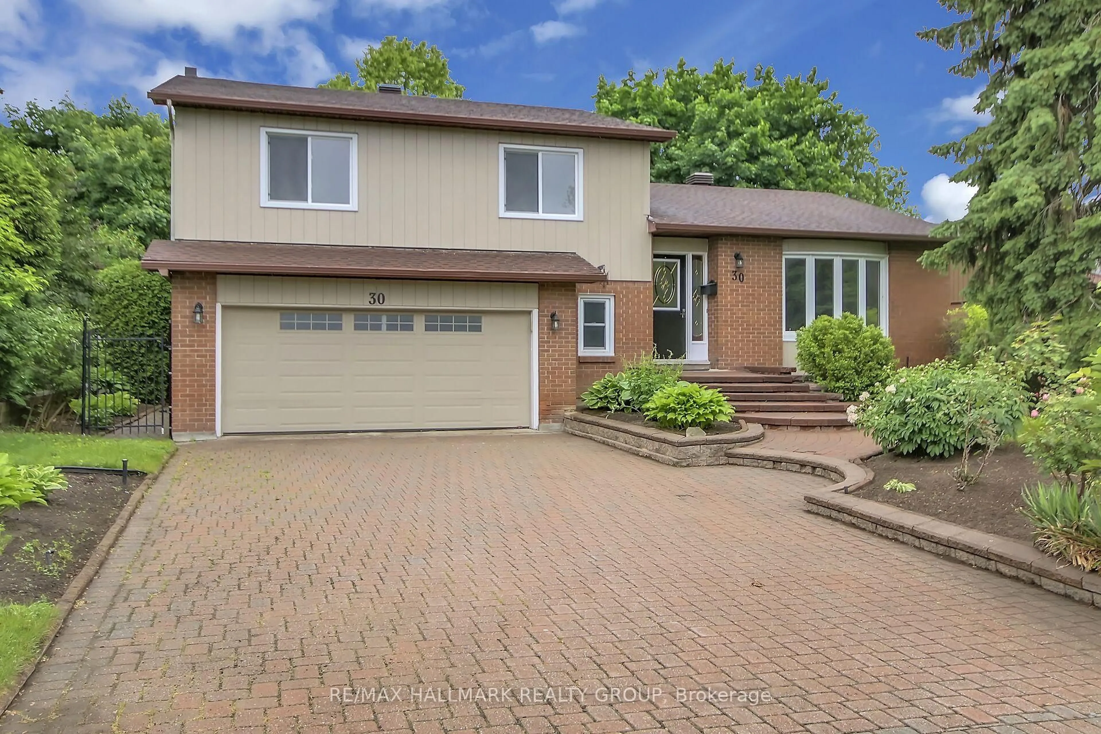 Home with brick exterior material, street for 30 Brodeur Cres, Kanata Ontario K2L 1Z3