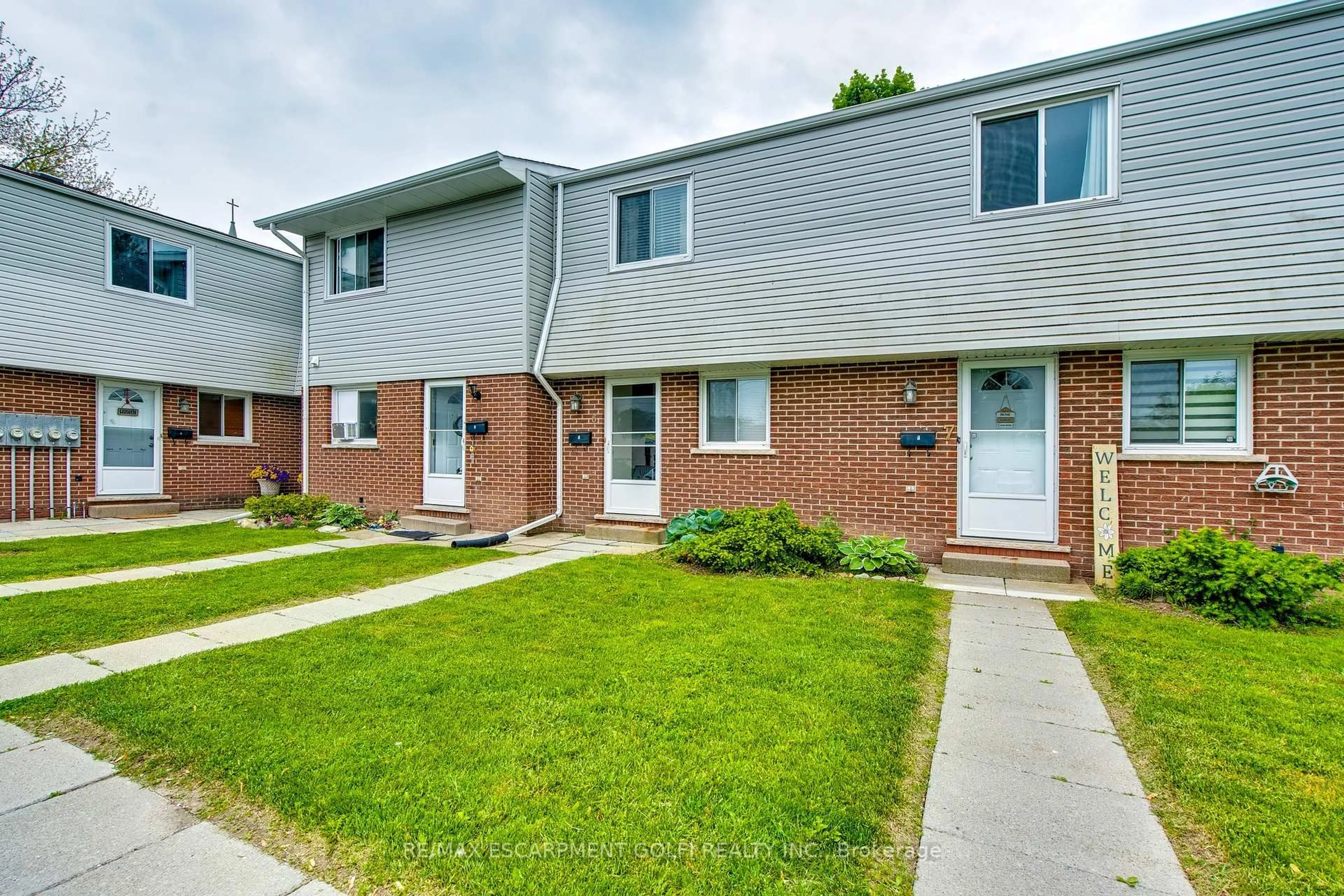 Home with brick exterior material, street for 63 Empire St #6, Welland Ontario L3B 2L3