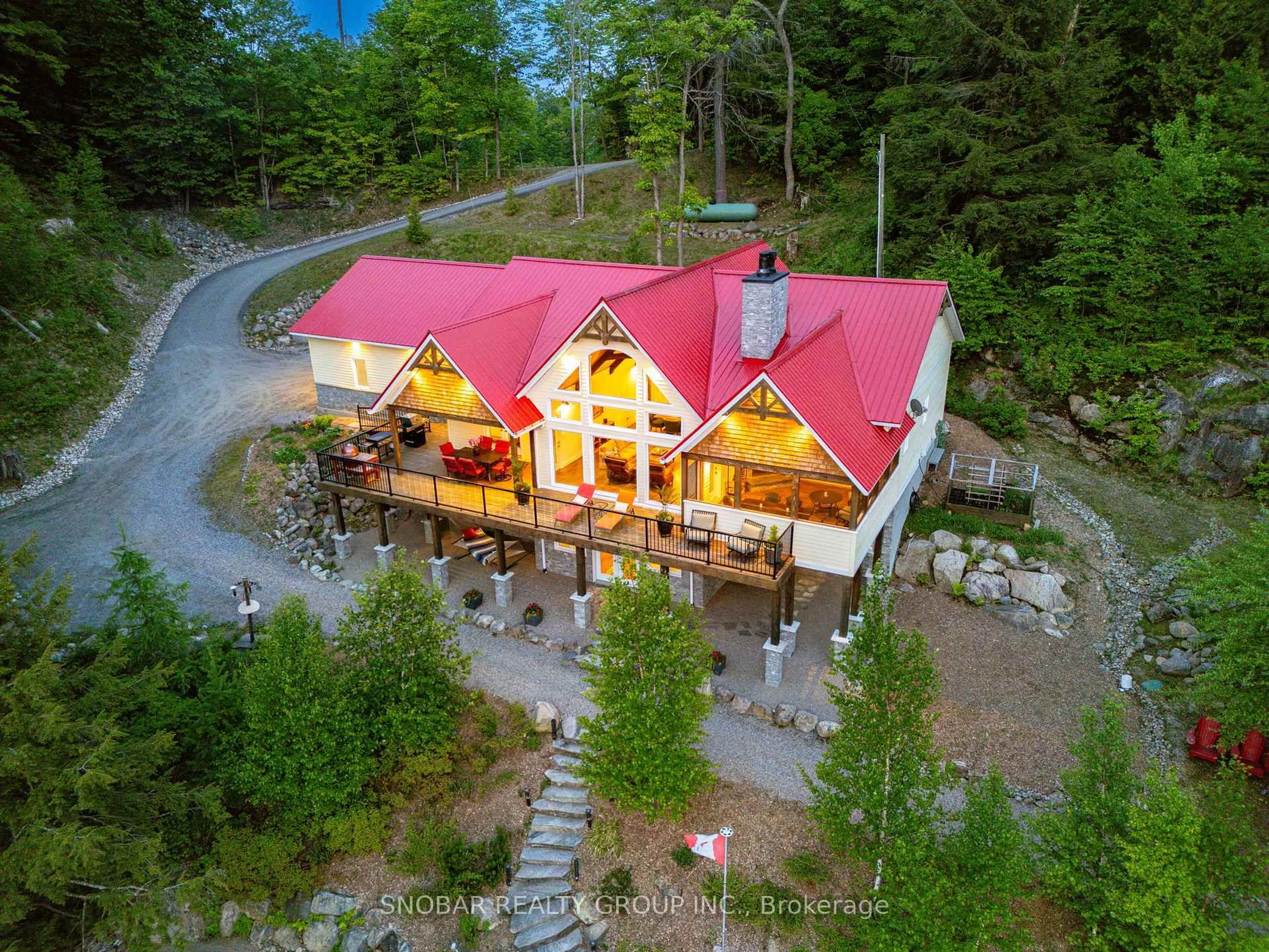 A pic from outside/outdoor area/front of a property/back of a property/a pic from drone, mountain view for 1523 Fish Hatchery Rd #25, Muskoka Lakes Ontario P0B 1M0