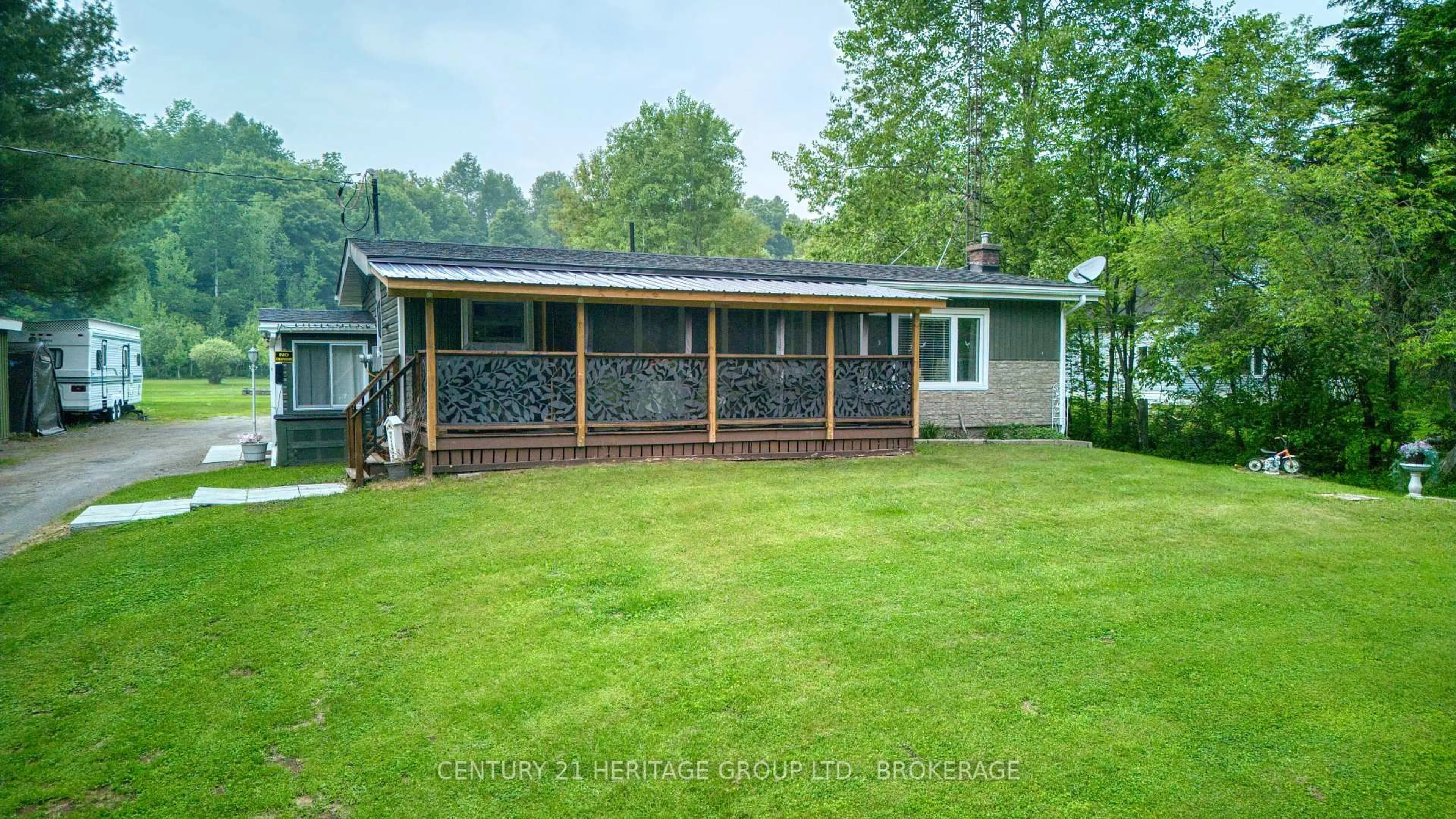 A pic from outside/outdoor area/front of a property/back of a property/a pic from drone, water/lake/river/ocean view for 122 Paudash School Rd, Bancroft Ontario K0L 1C0