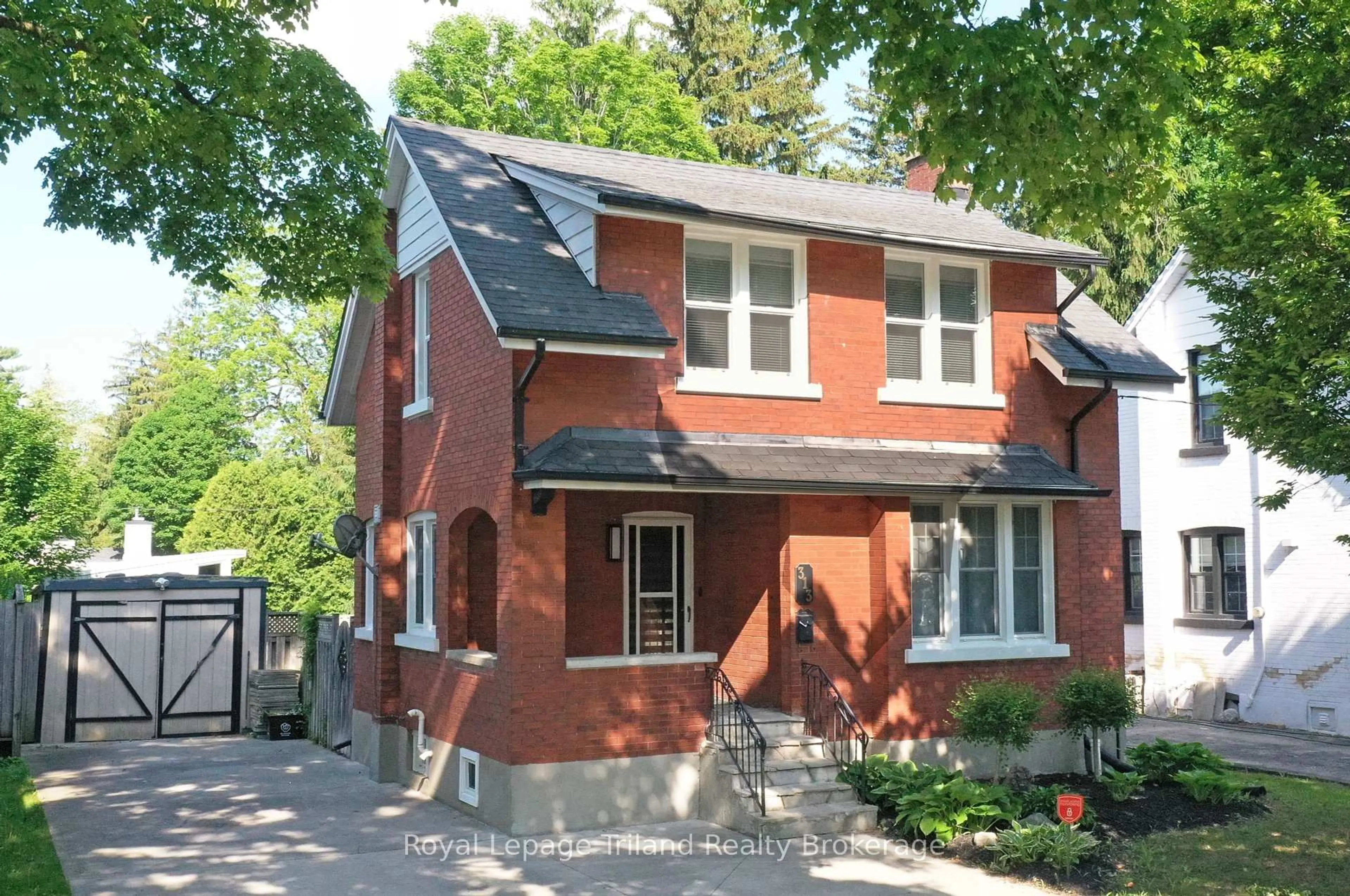 Home with brick exterior material, street for 313 Riddell St, Woodstock Ontario N4S 6N8