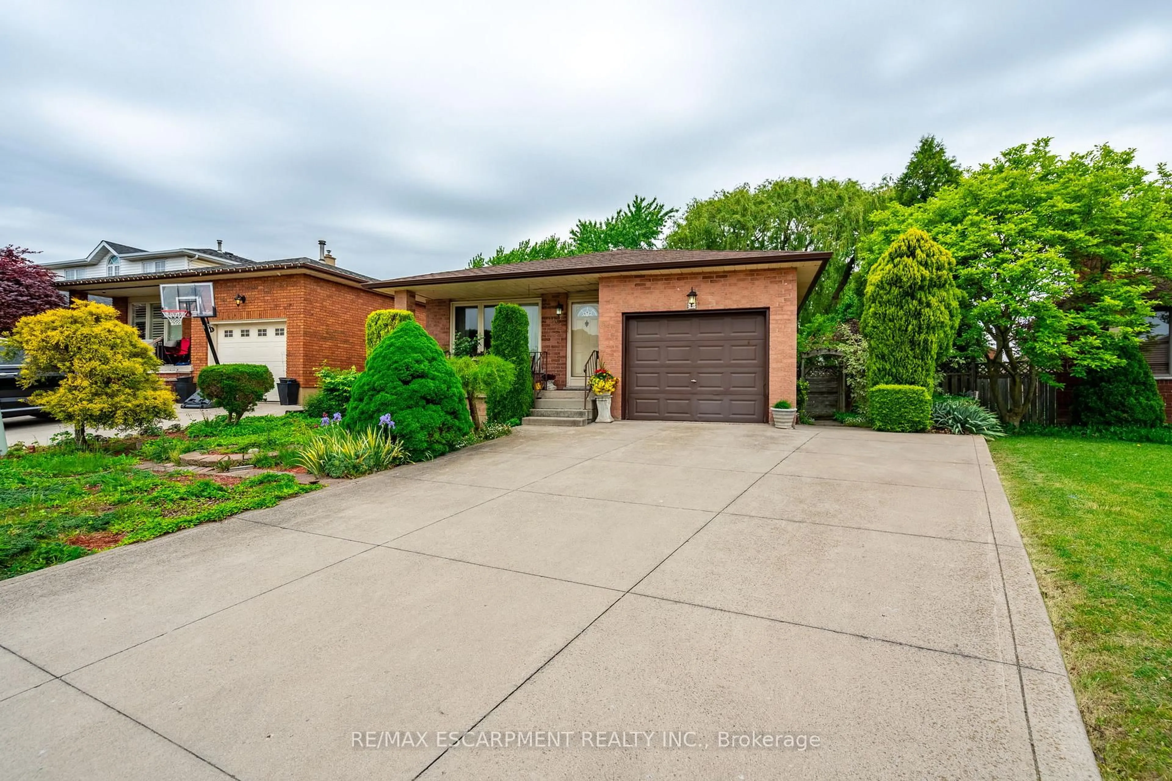 Home with brick exterior material, street for 43 Trenholme Cres, Hamilton Ontario L8W 2L4