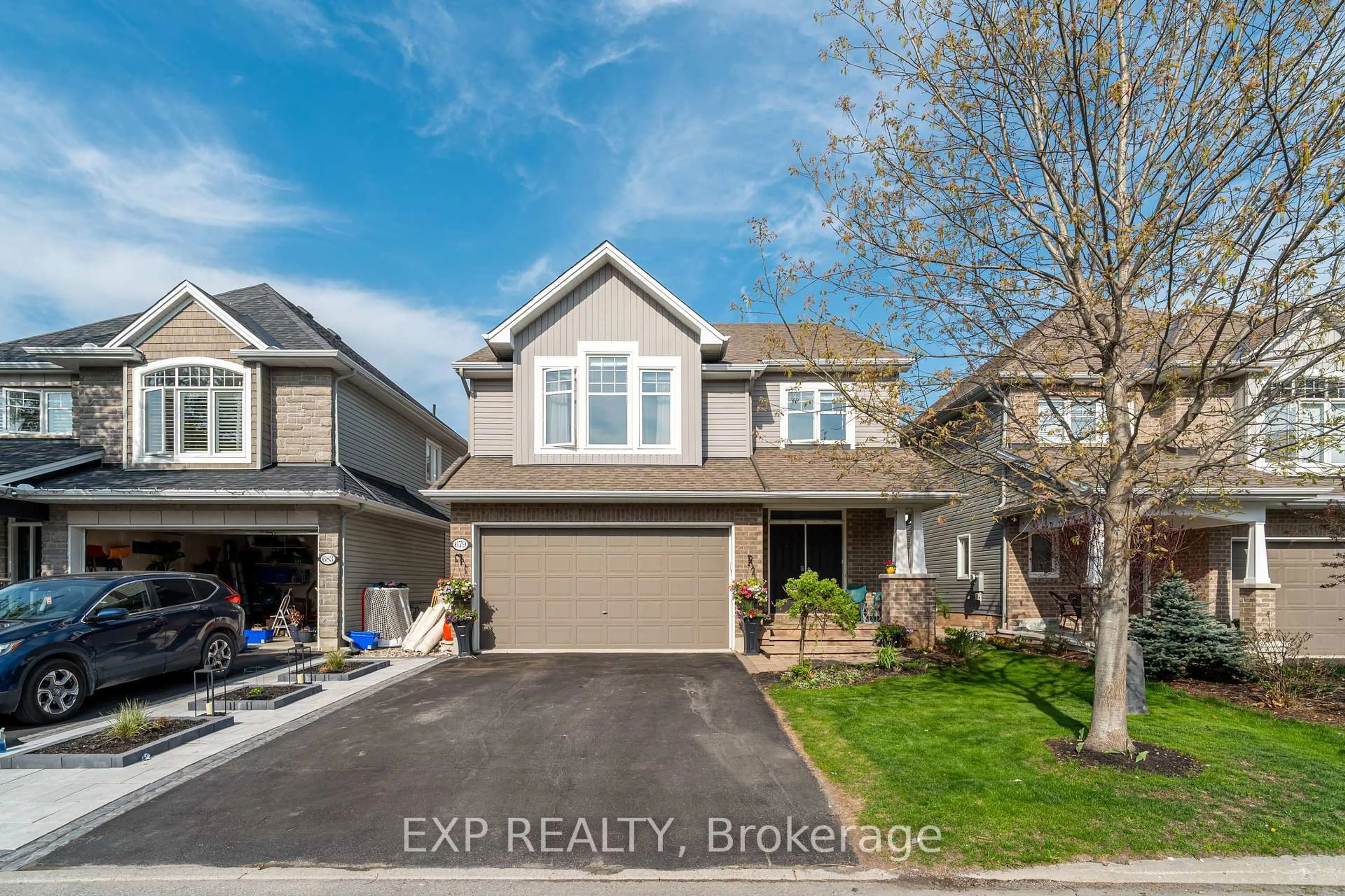 A pic from outside/outdoor area/front of a property/back of a property/a pic from drone, street for 679 Rockrose Way, Ottawa Ontario K1T 0L7