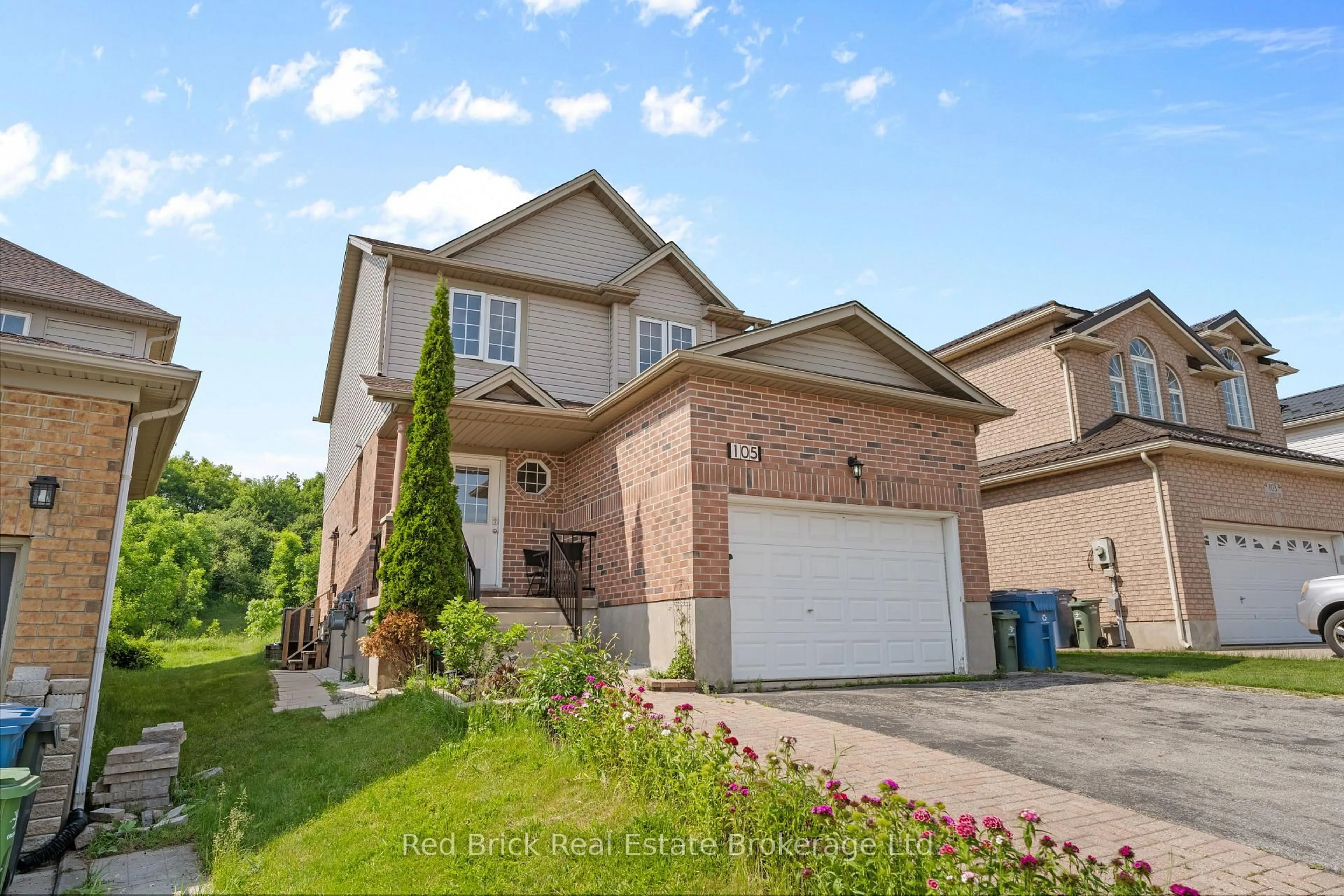 Home with brick exterior material, street for 105 Flaherty Dr, Guelph Ontario N1K 1Y7