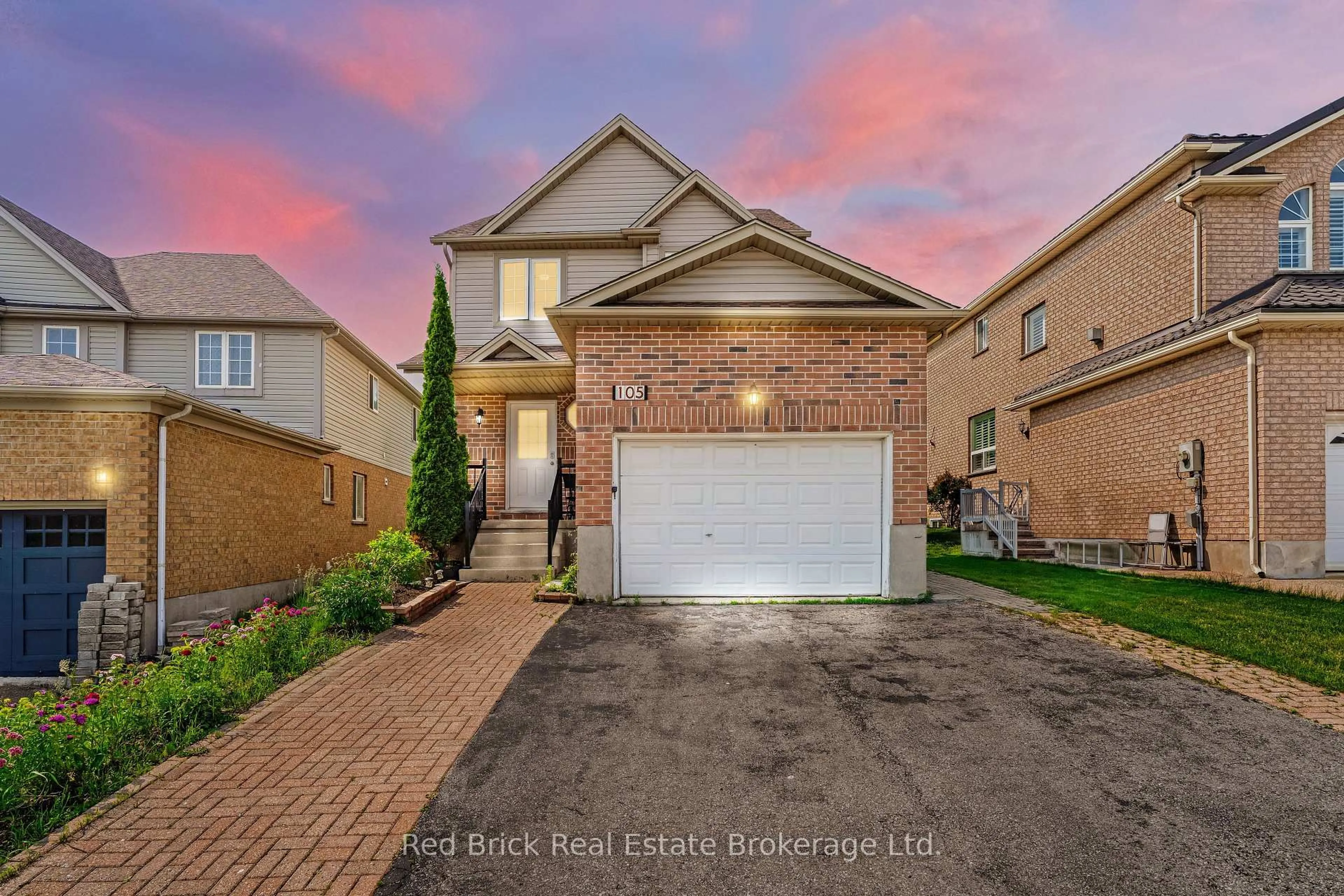 Home with brick exterior material, street for 105 Flaherty Dr, Guelph Ontario N1K 1Y7