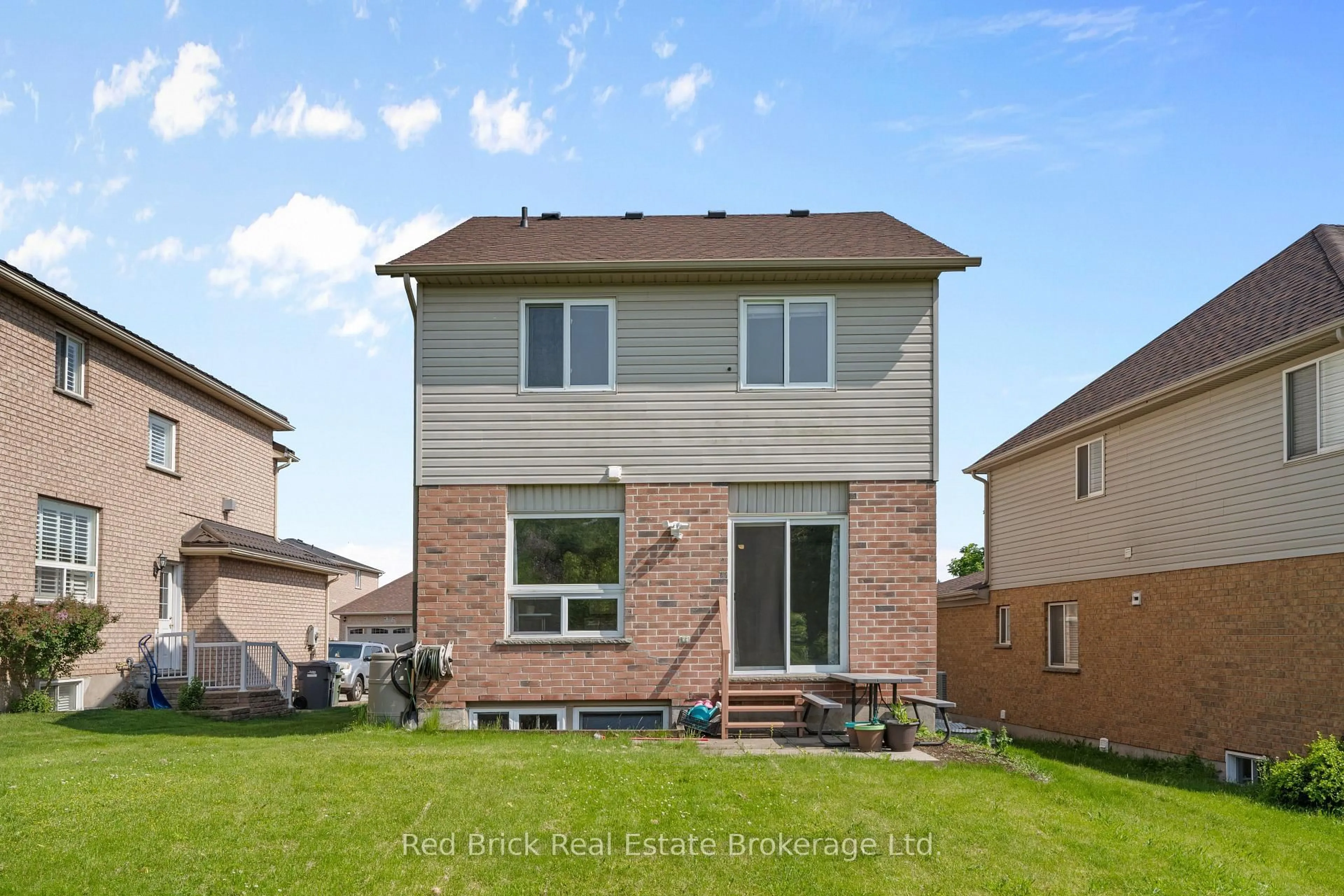 Home with brick exterior material, street for 105 Flaherty Dr, Guelph Ontario N1K 1Y7