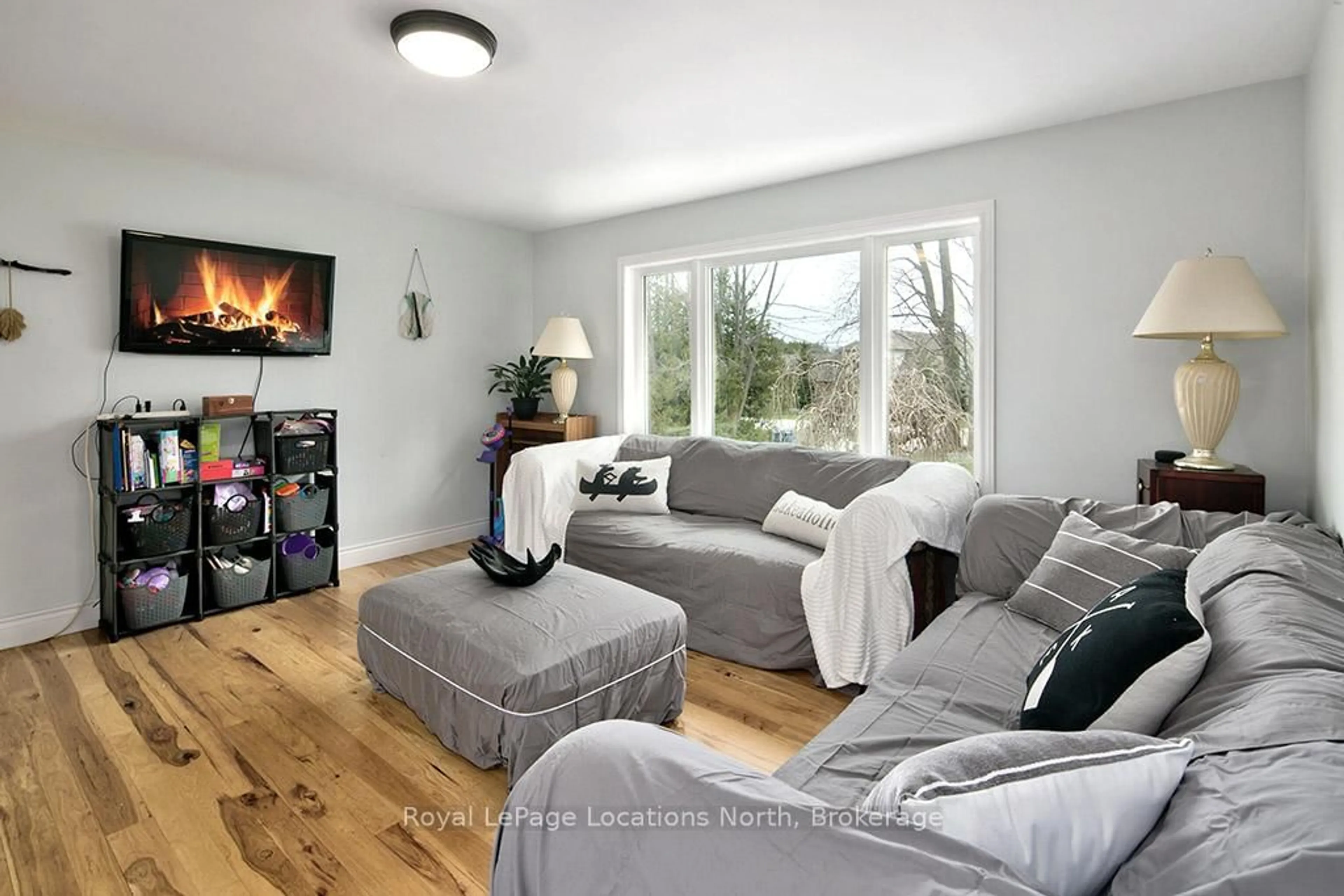 Living room with furniture, wood/laminate floor for 194 Centre St, Meaford Ontario N4L 1E8